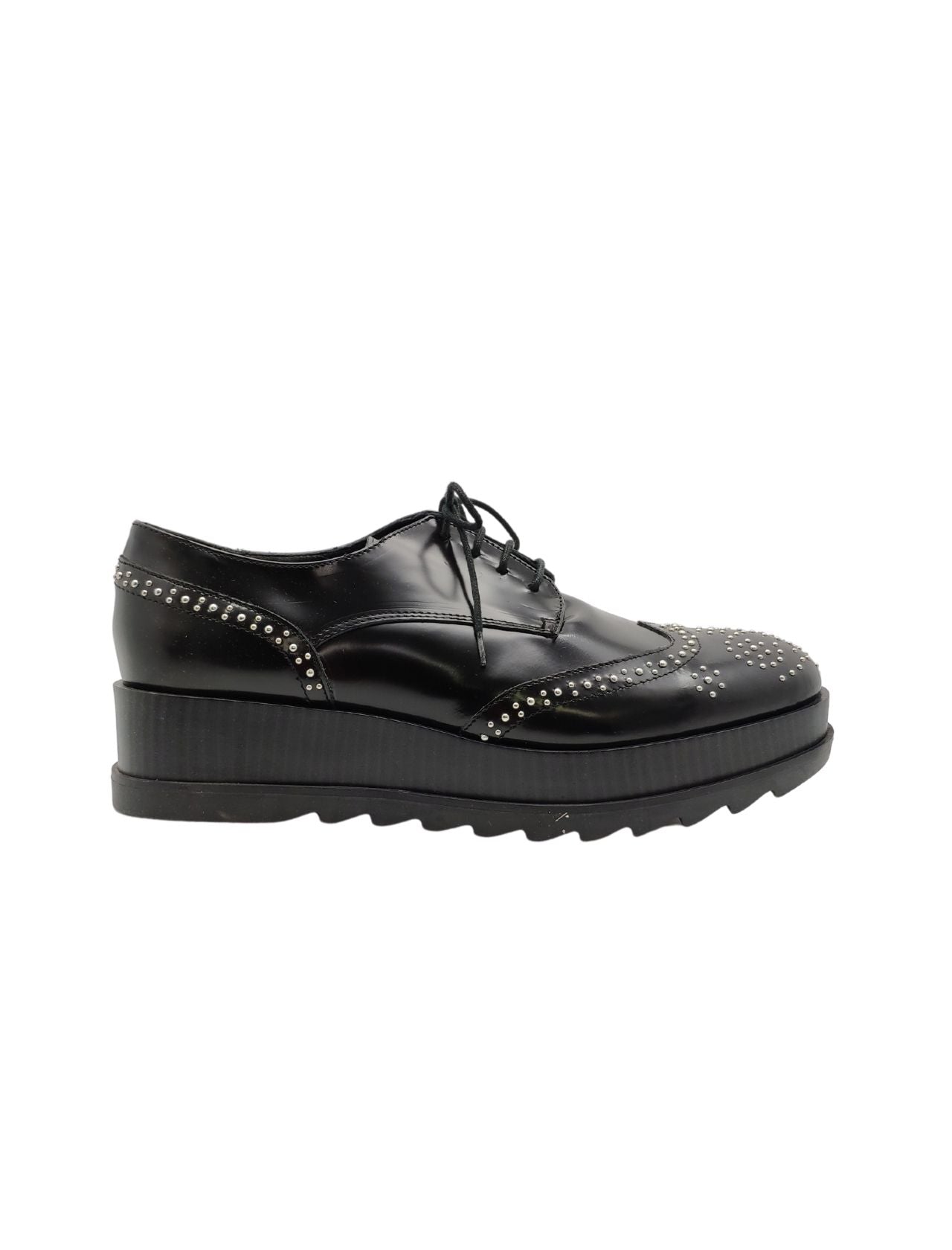Women's lace-up shoes in black leather with studs and wedge