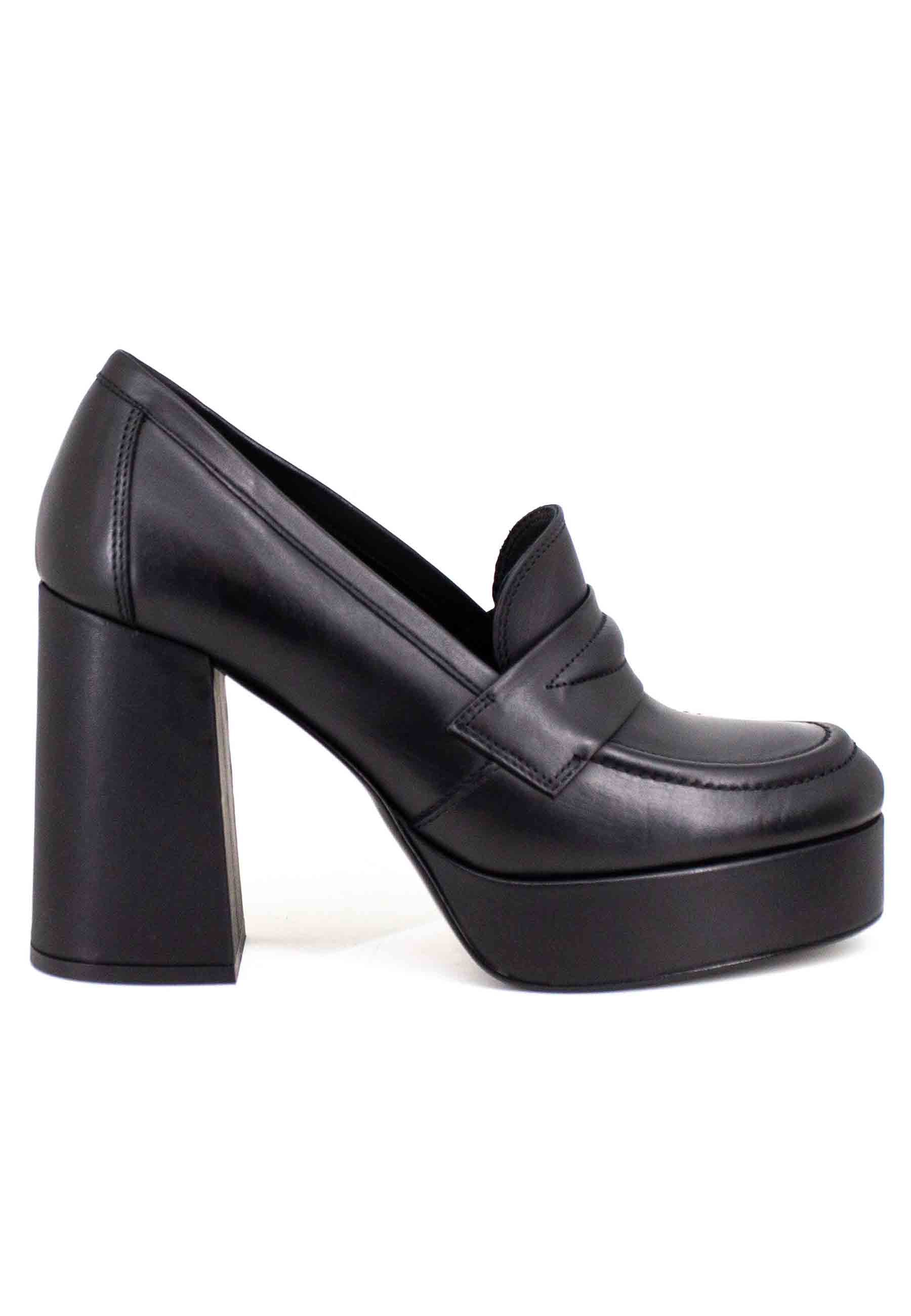 Women's black leather loafers with high heel and platform
