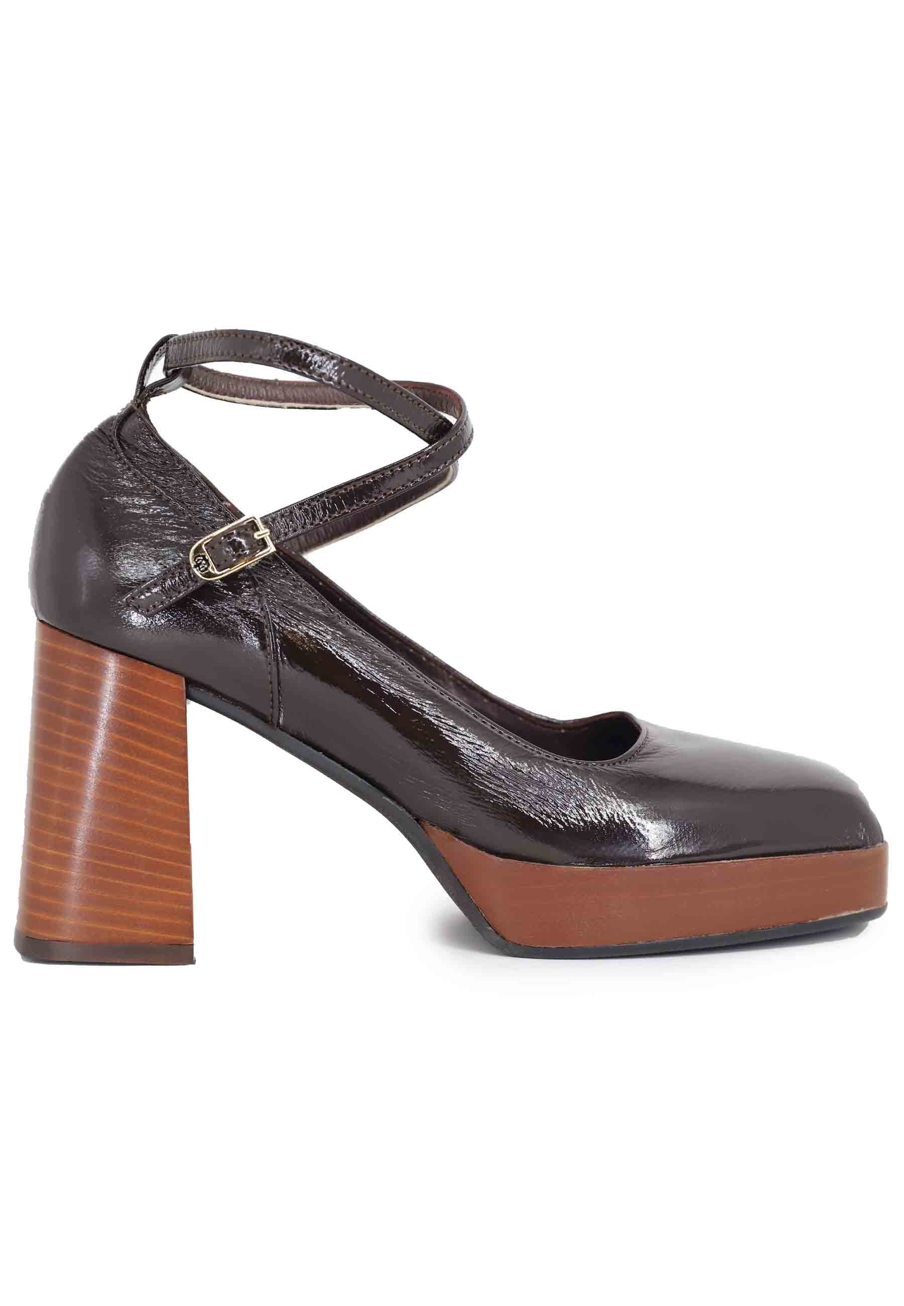 Women's decollete in dark brown leather with straps and high heel