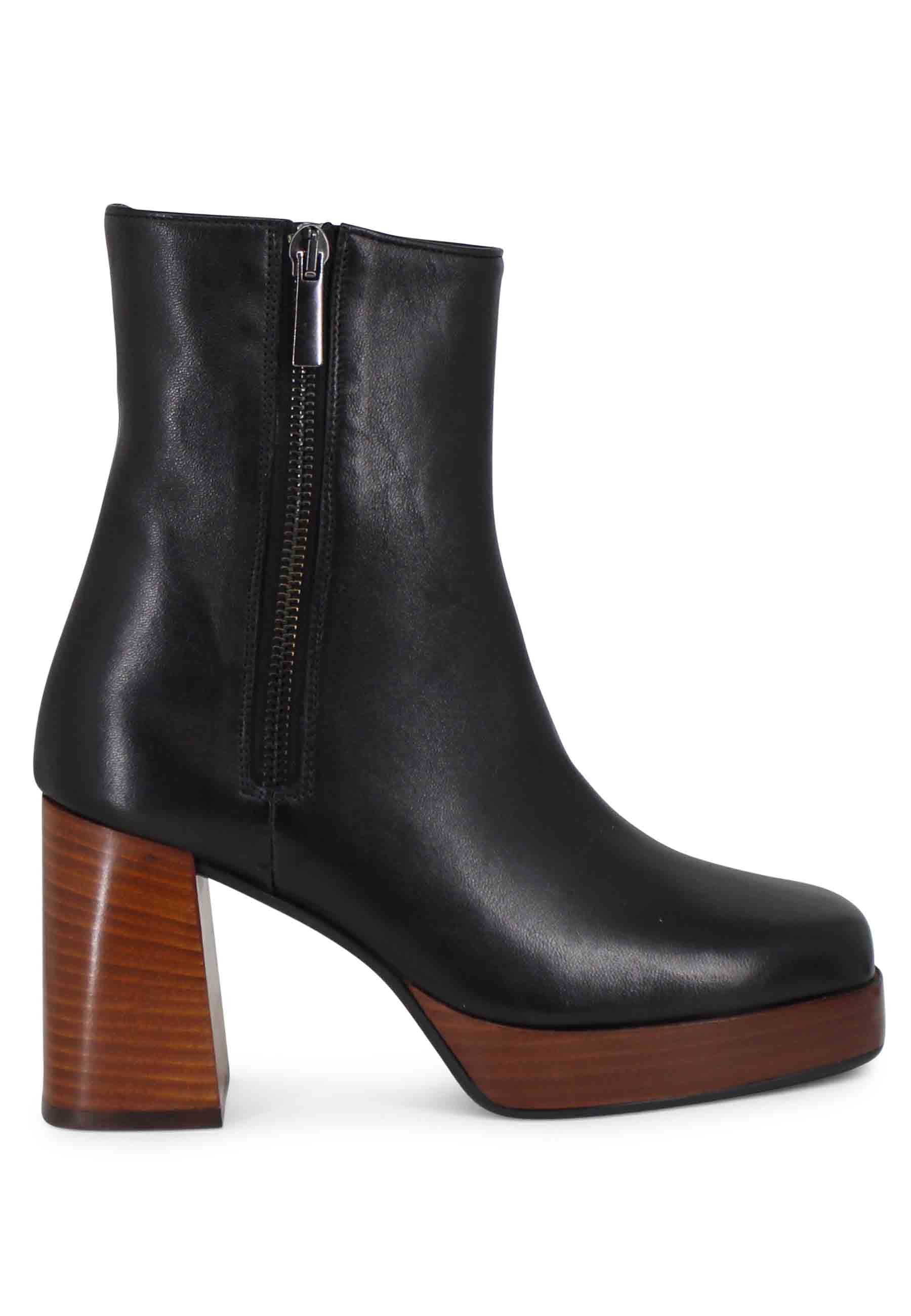 Women's black leather ankle boots with high heel and platform with external zip