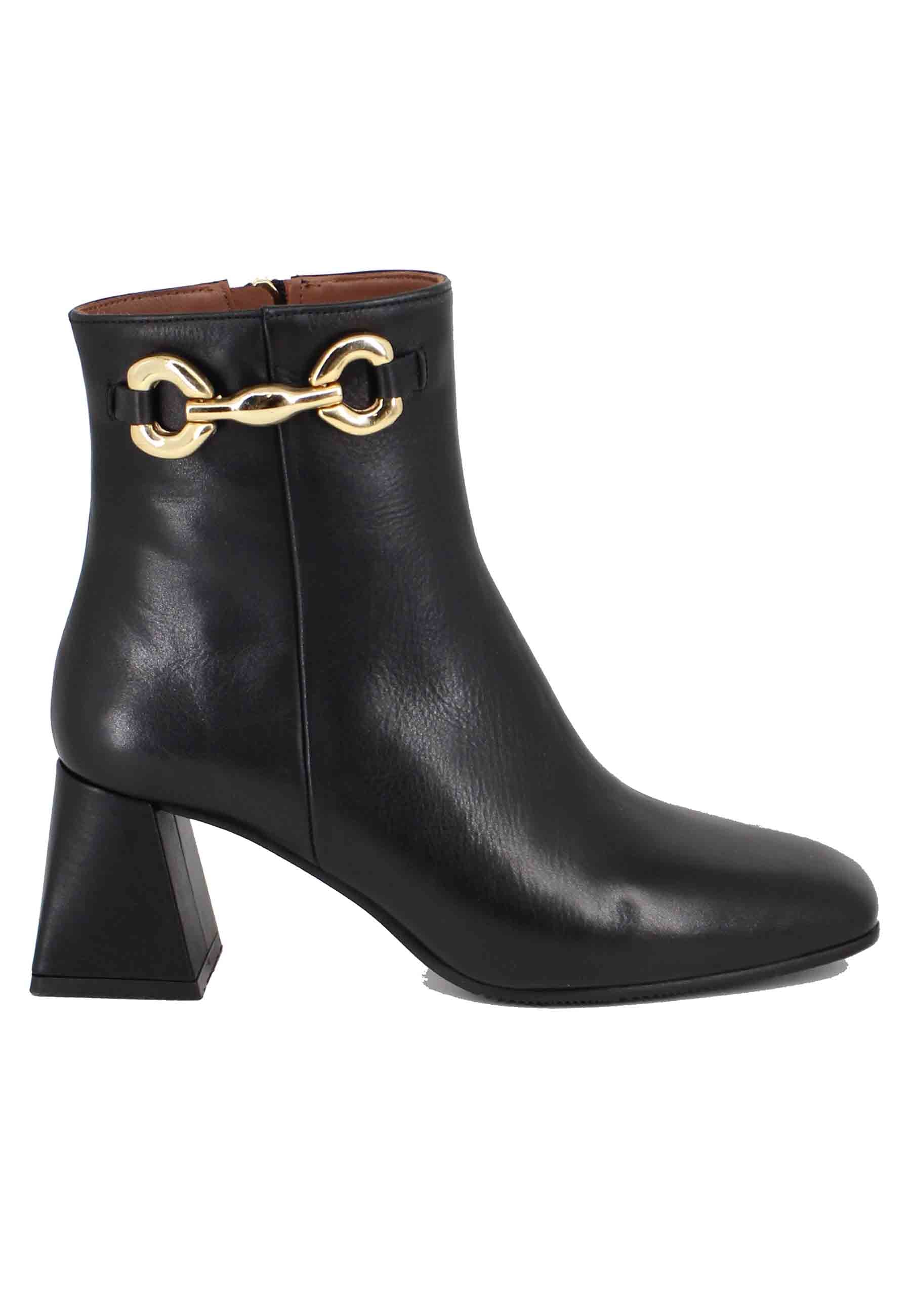 Women's black leather ankle boots with gold clamp