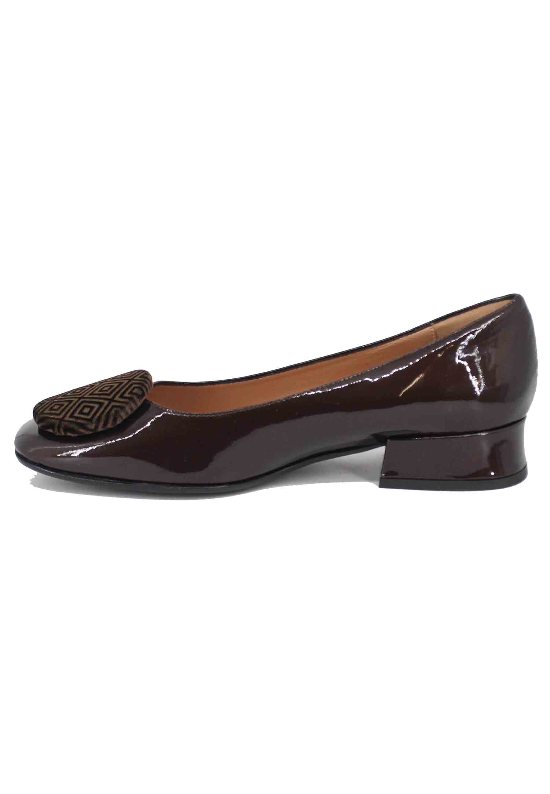 Women's dark brown leather ballet flats with suede accessory