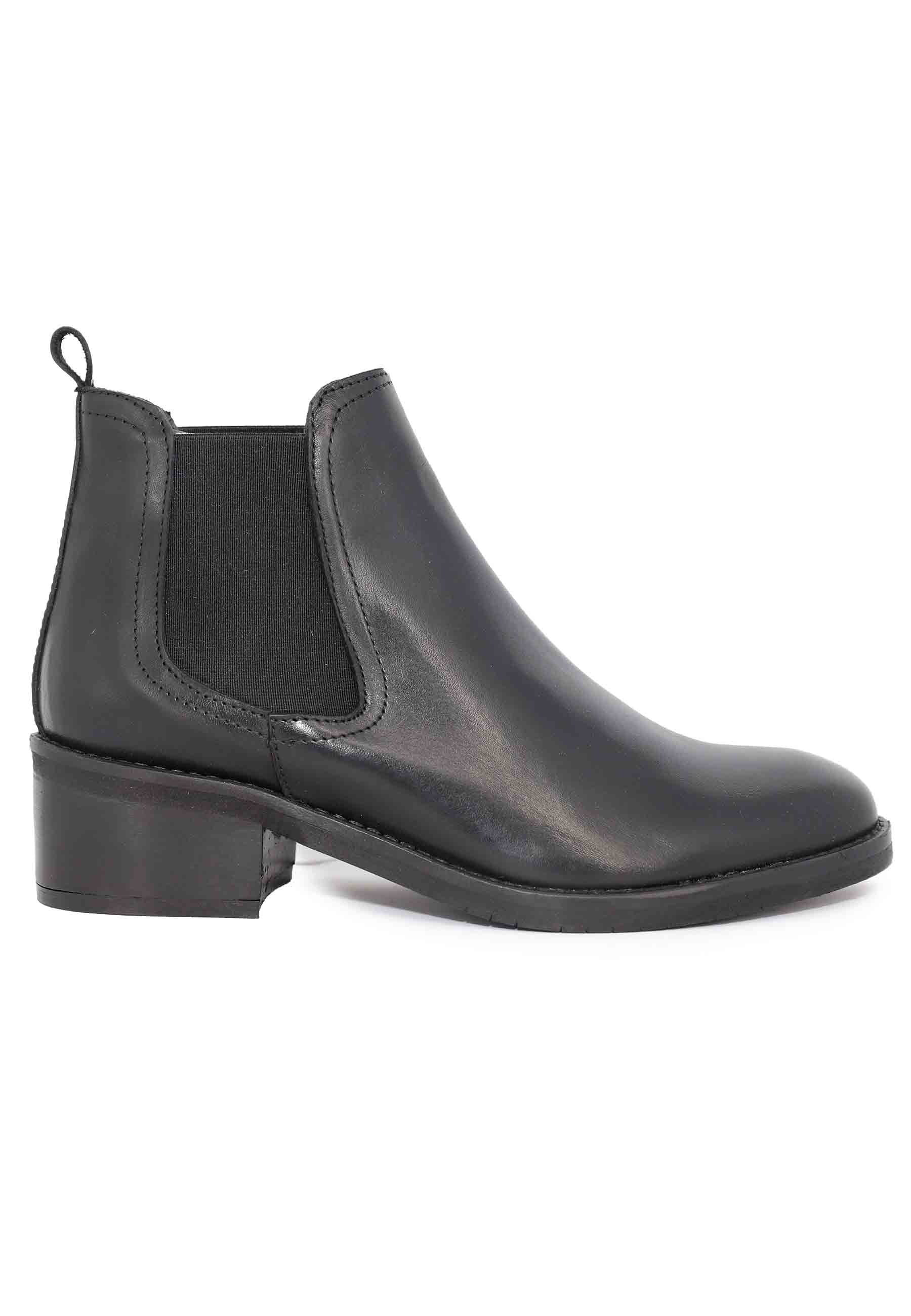 Black leather chelsea boot with round toe and low heel