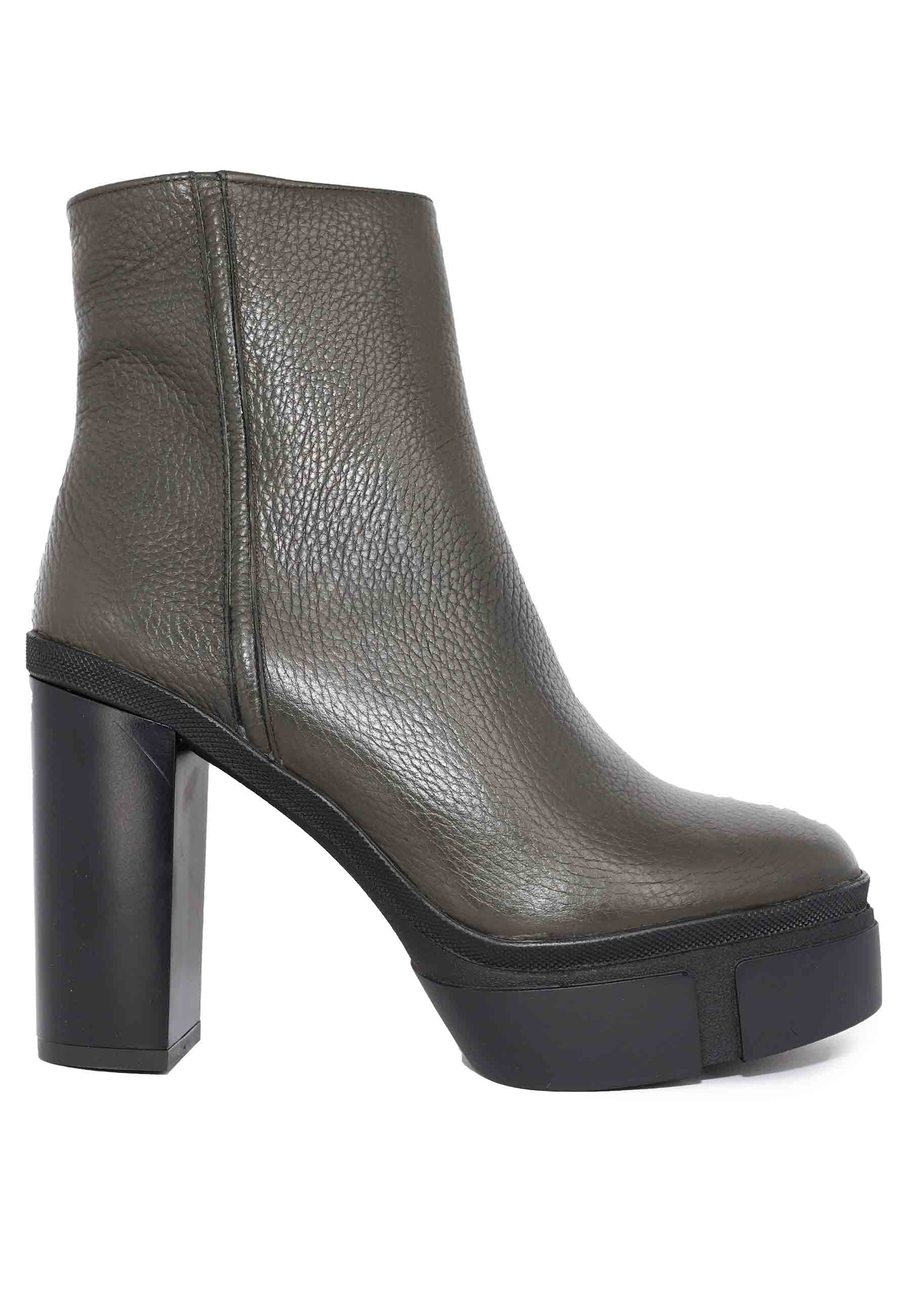 Women's green leather ankle boots with high heel and platform