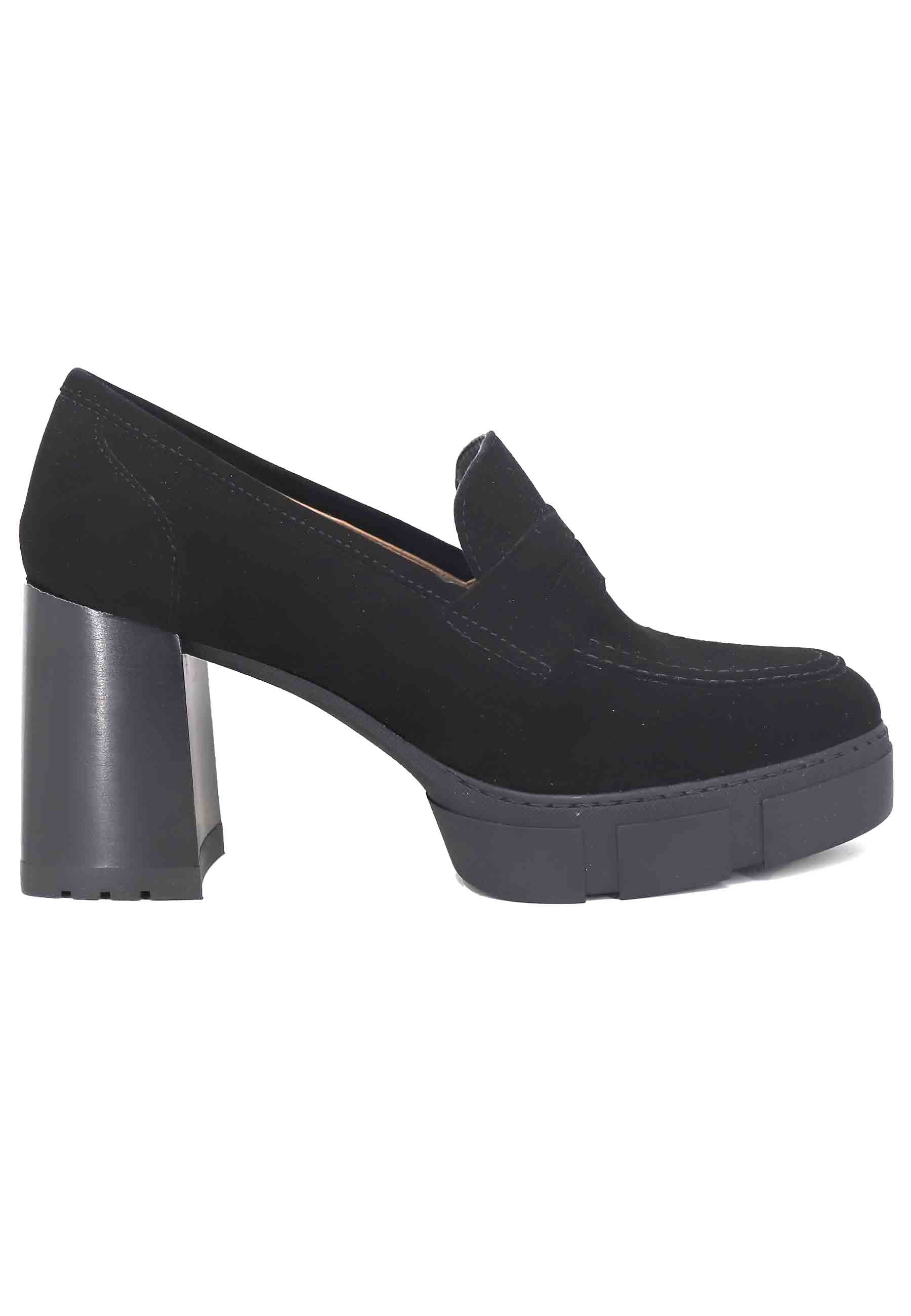Women's black suede loafers with high heel and platform