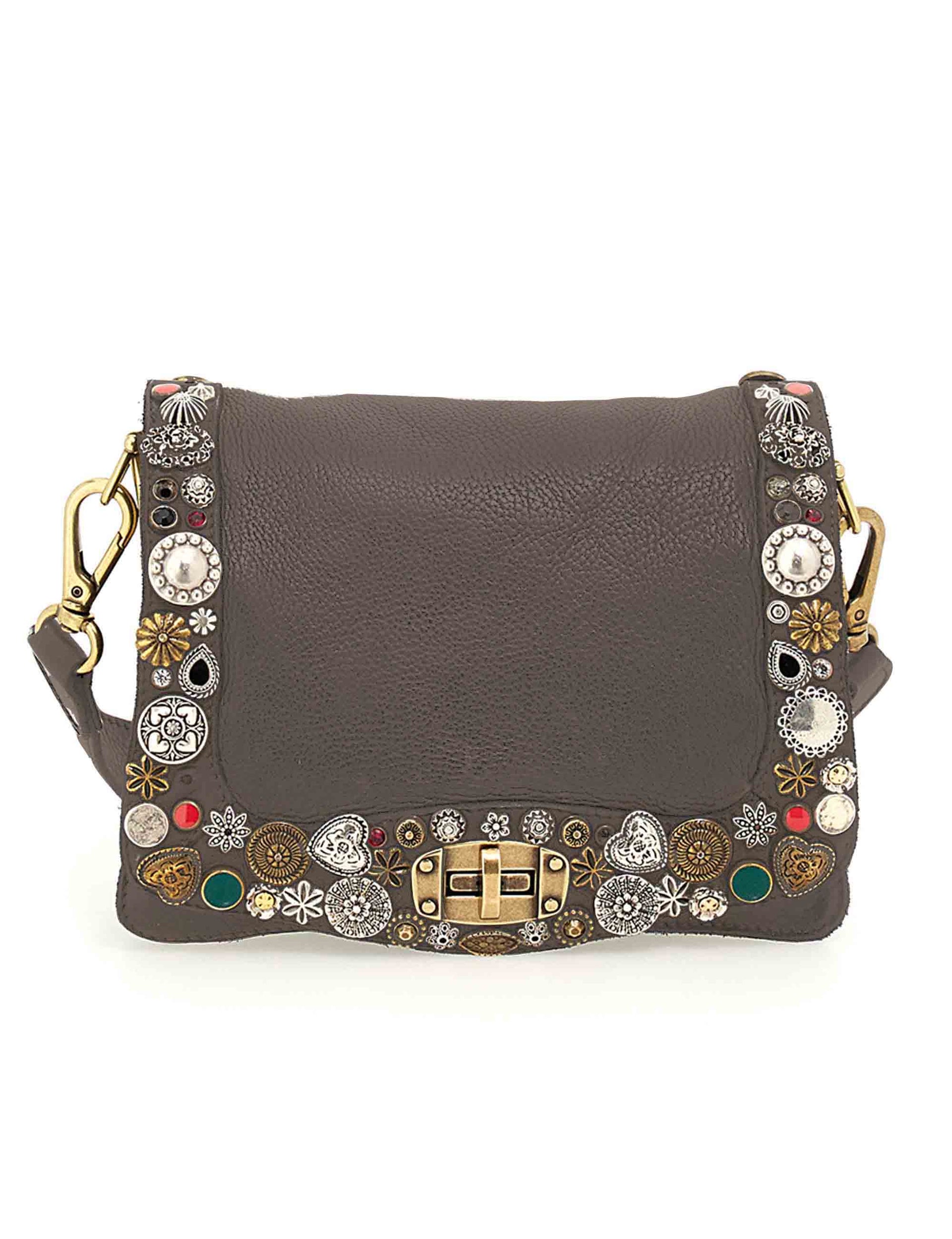 Women's grey leather clutch bags with studs