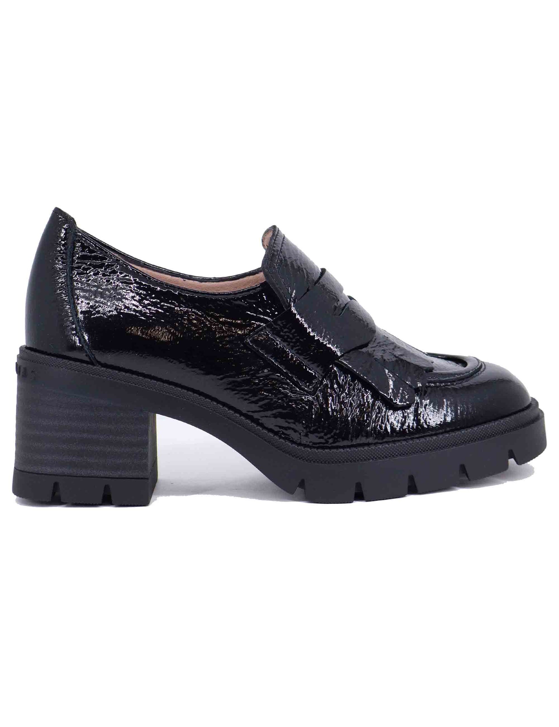 Women's black patent leather loafers with rubber sole