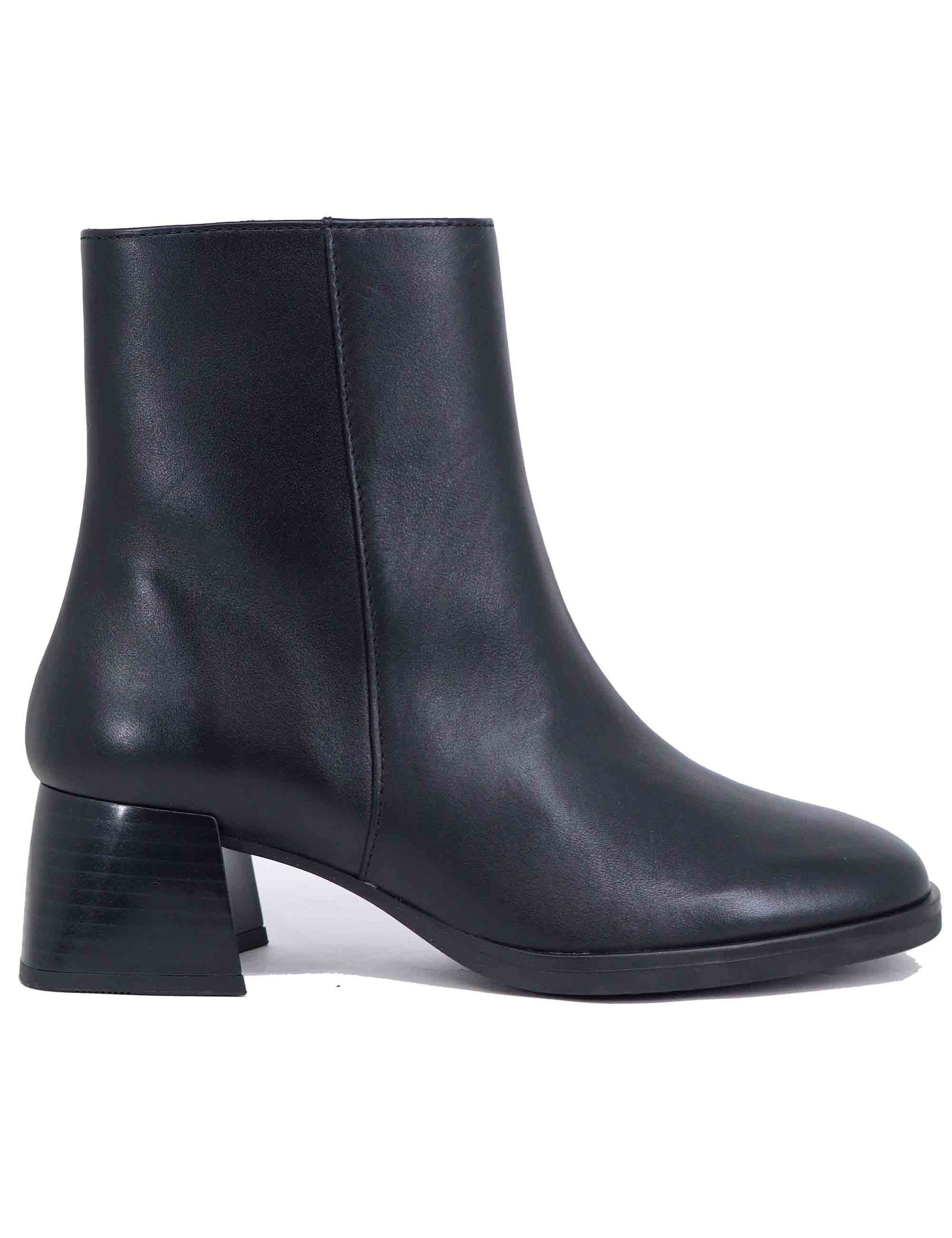 Women's black leather ankle boots with low heel