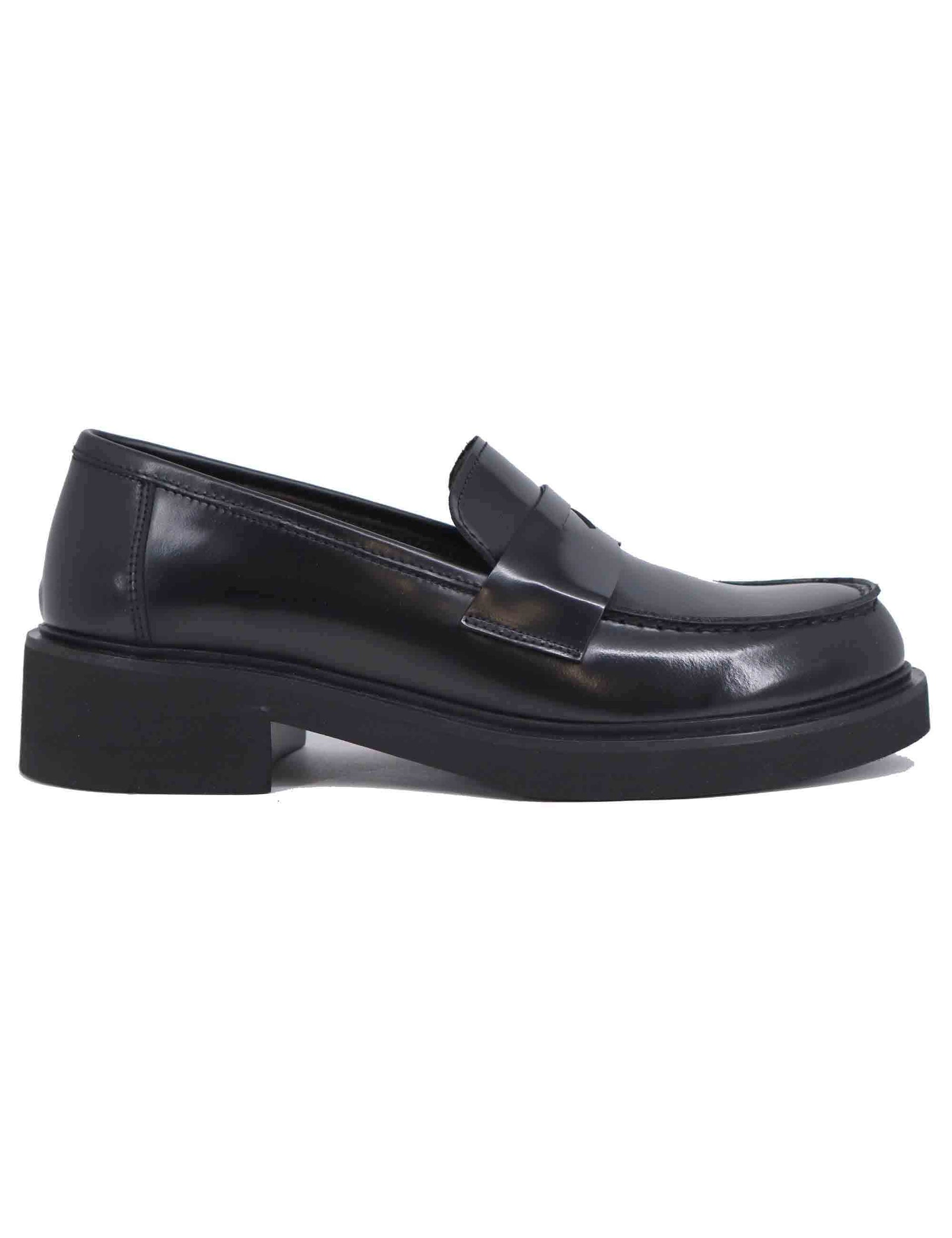 Women's black leather loafers with rubber sole