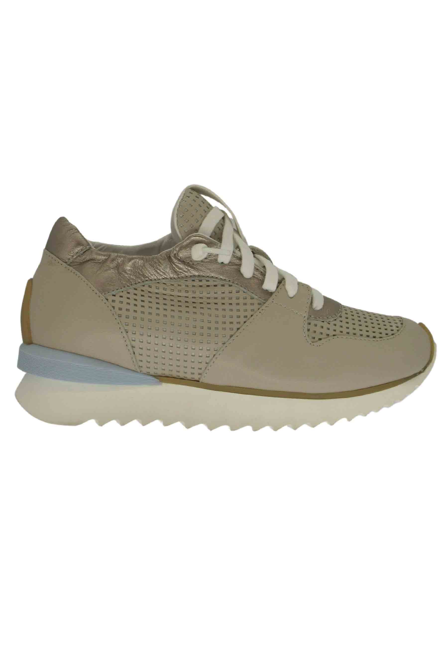 Women's sneakers in taupe leather with high rubber sole