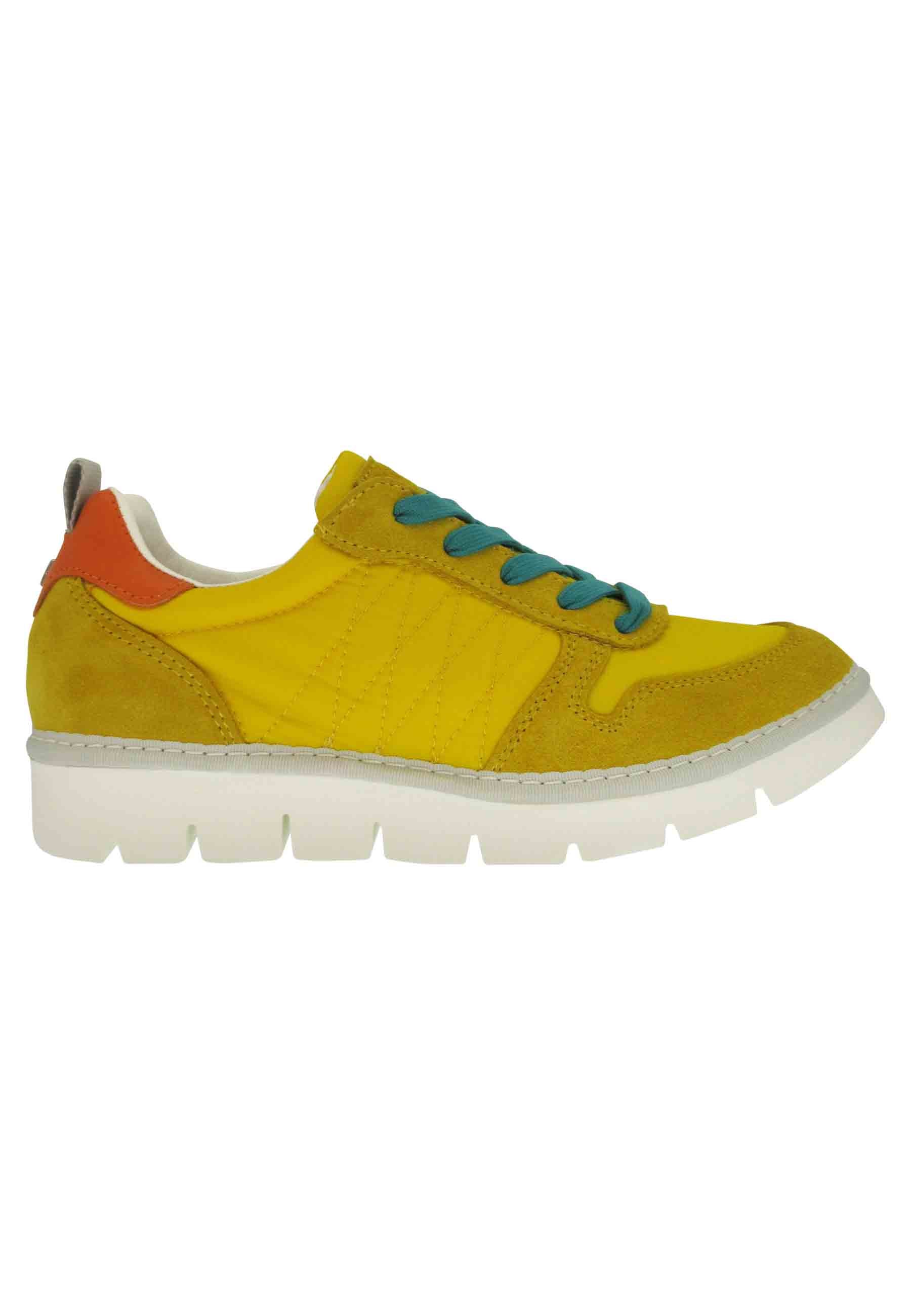 Women's sneakers in yellow fabric and suede with wedge sole
