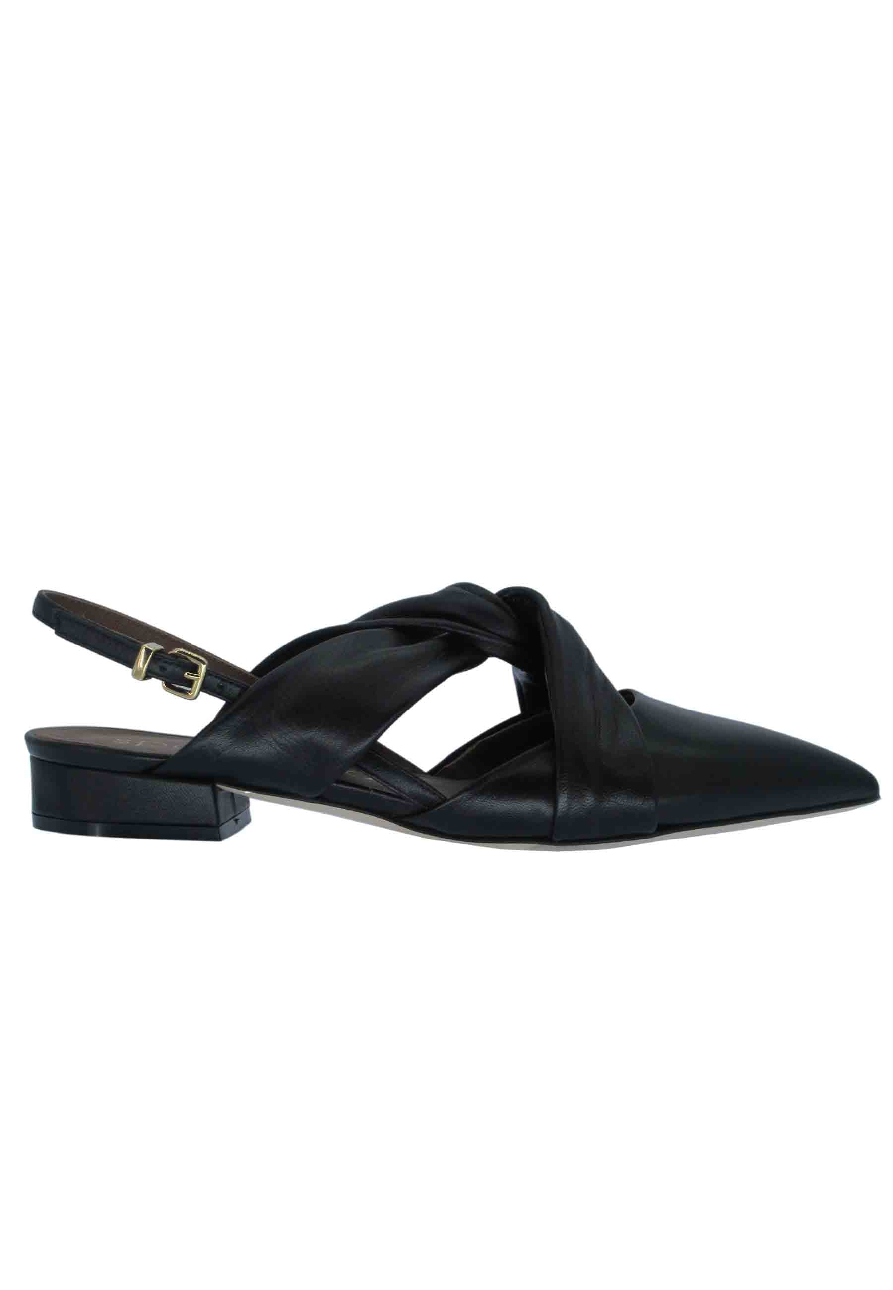 Women's decollete in black leather with low heel and ankle strap