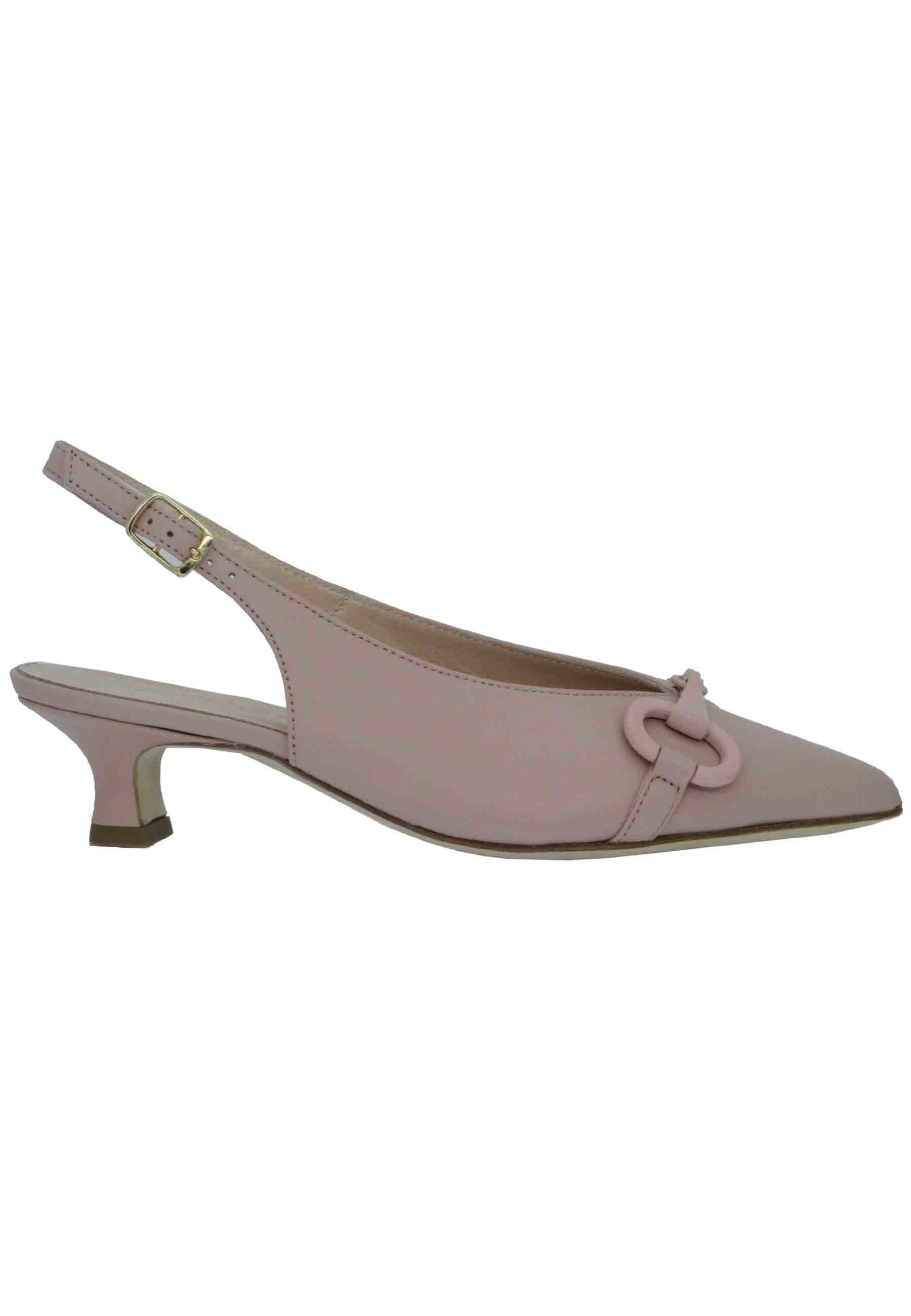 Women's nude leather pumps with low heel matching accessory