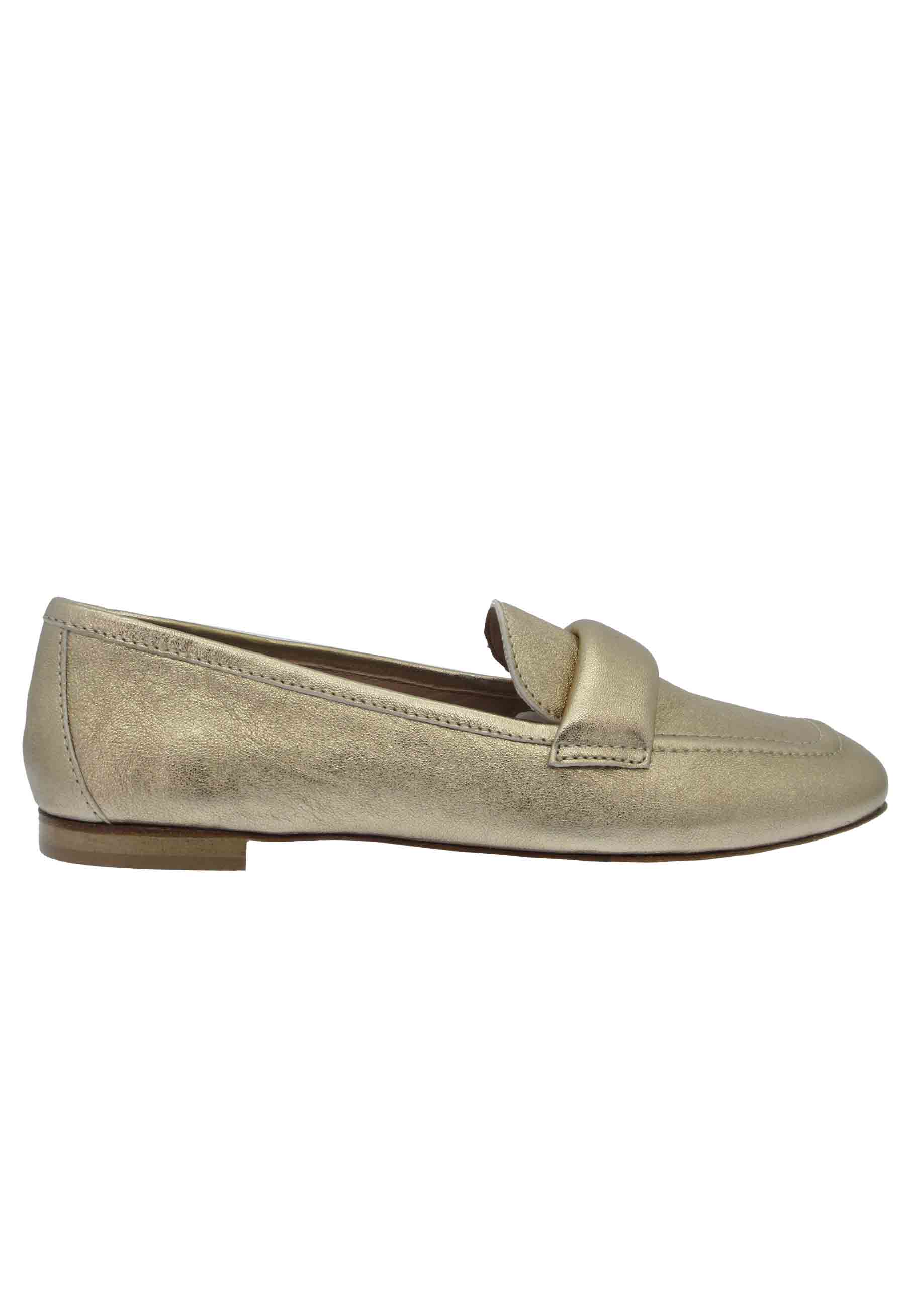 Women's loafers in gold laminated leather with low heel