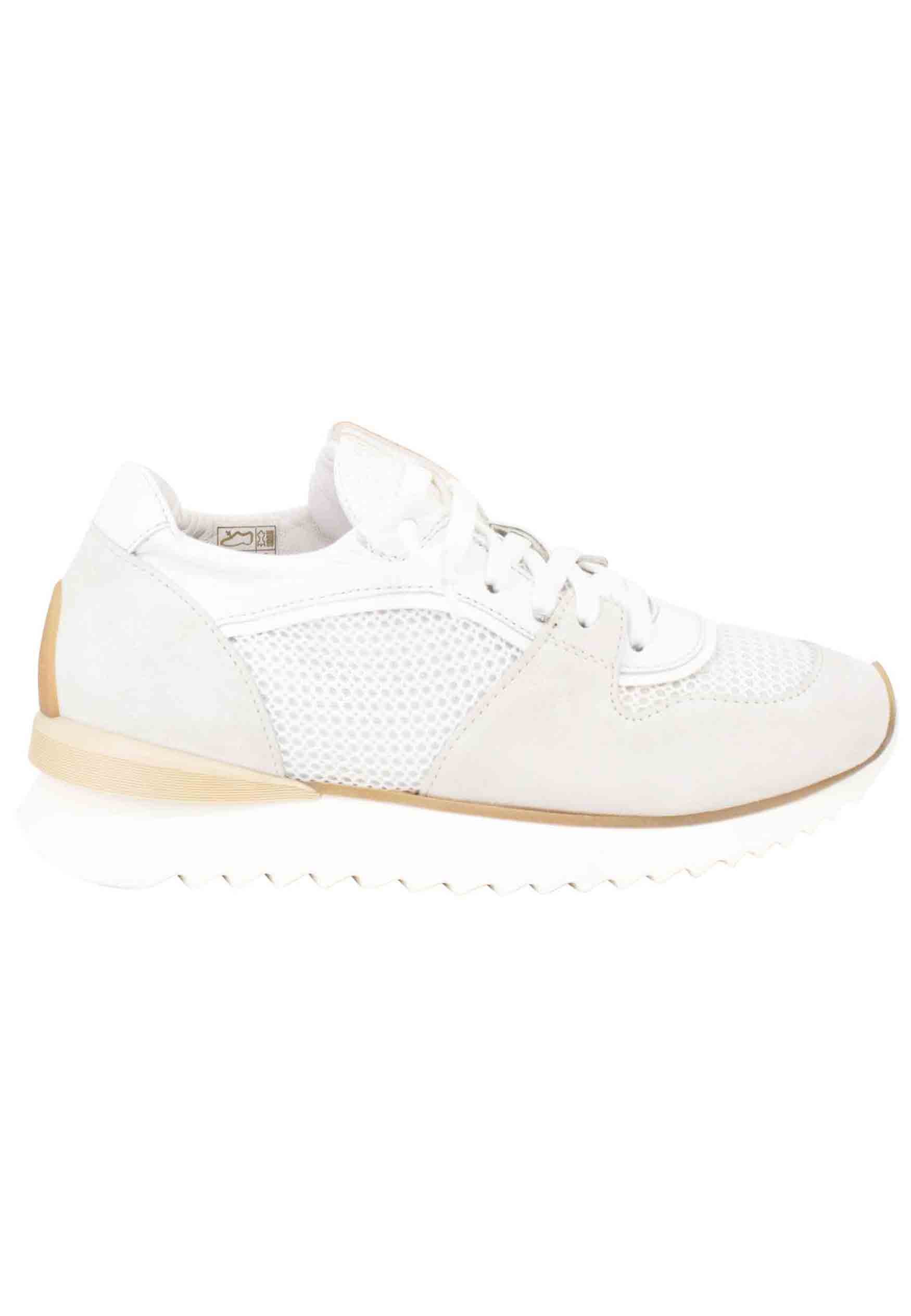 Women's sneakers in leather and white fabric with running sole