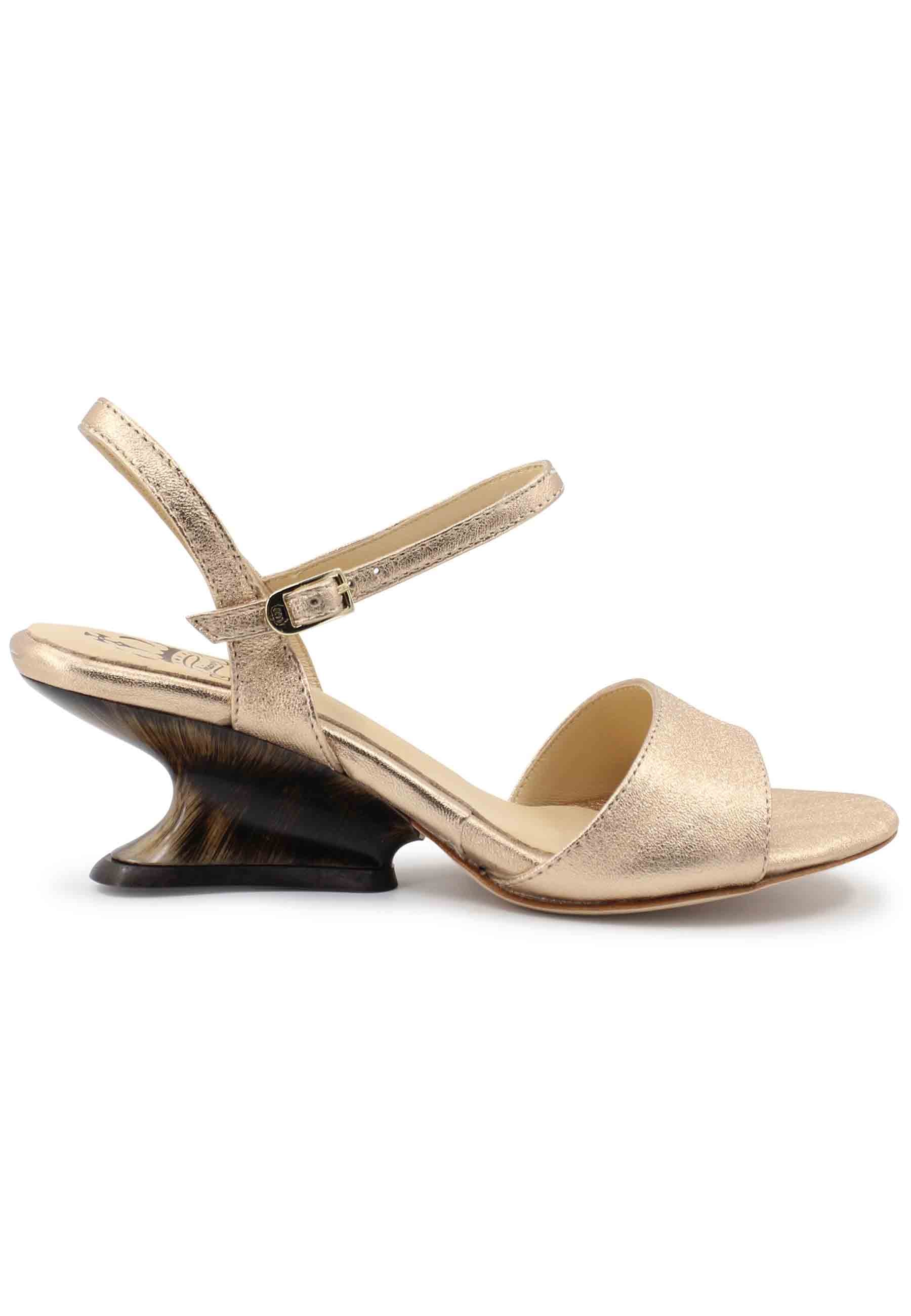 Women's sandals in nude laminated leather with low wedge