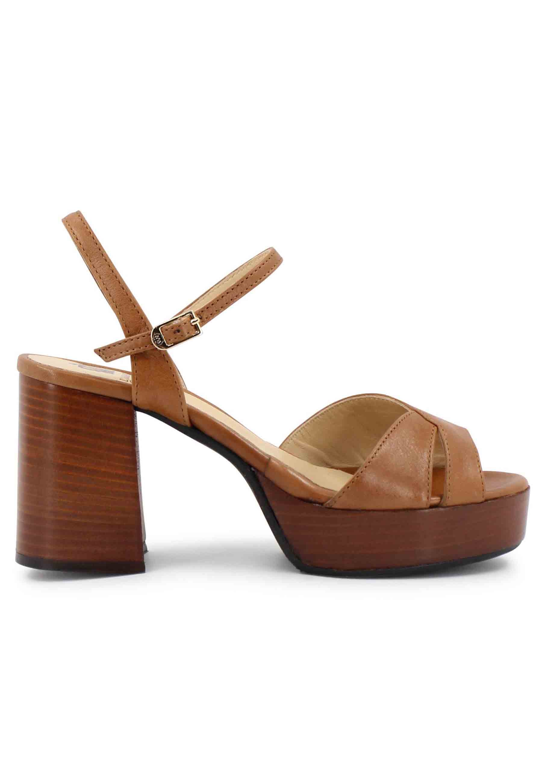Women's sandals in tan leather with leather strap and heel and platform