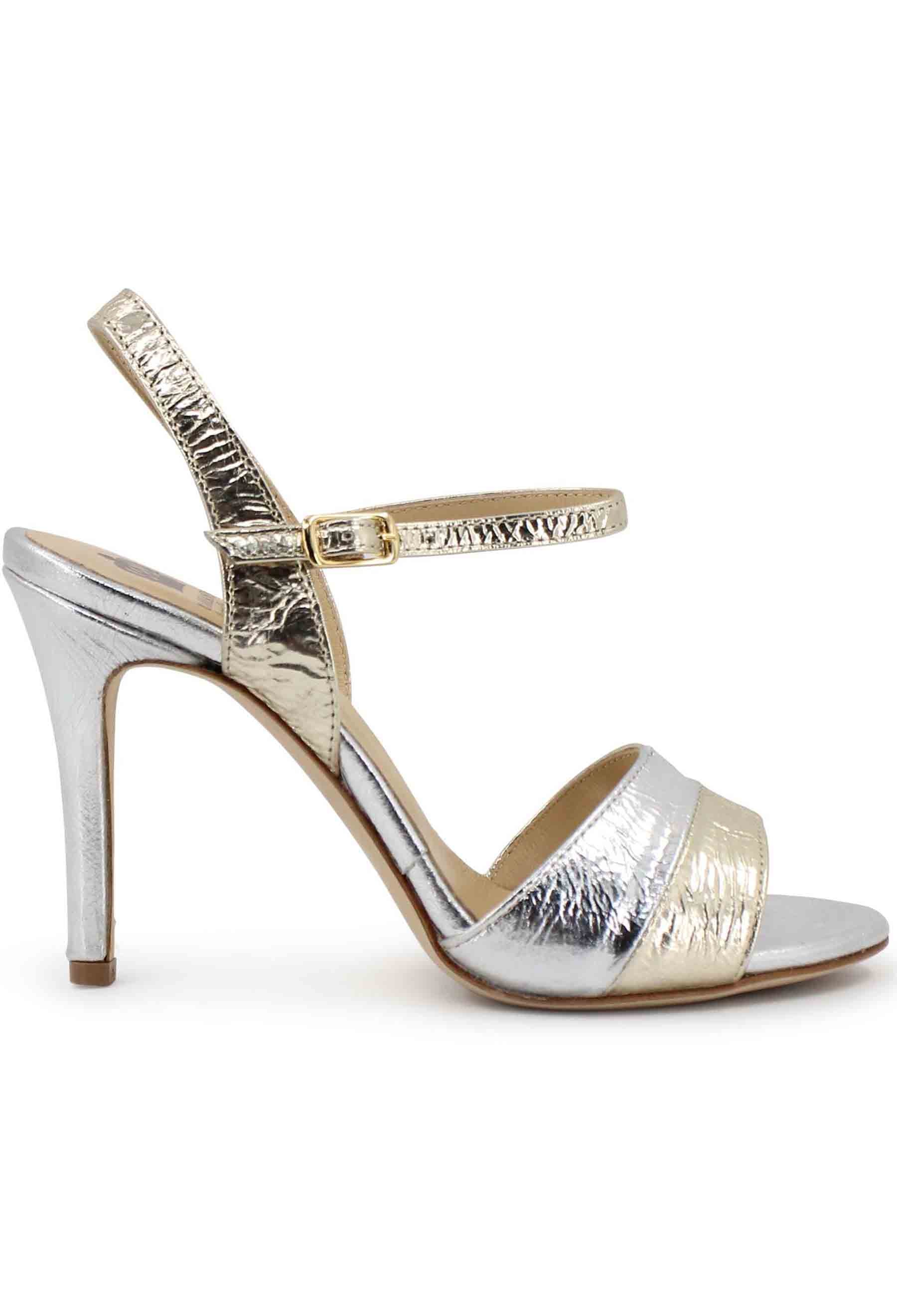 Women's sandals in gold laminated leather with high heel and ankle strap