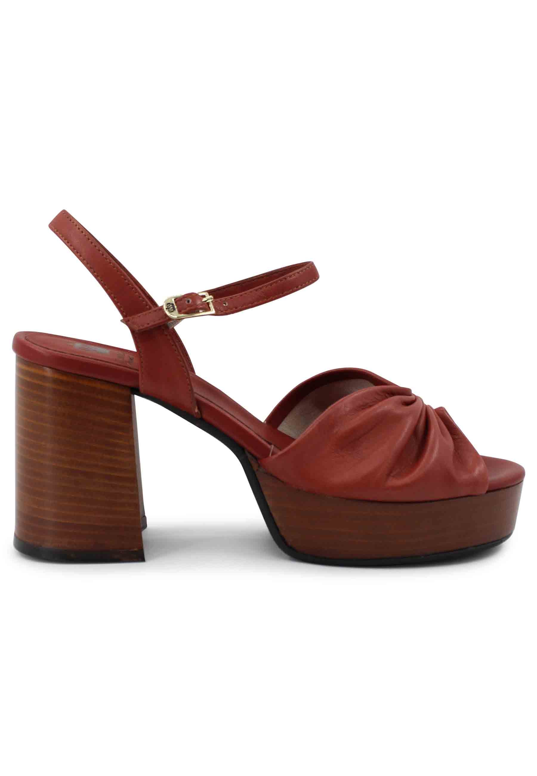 Women's sandals in brick leather with leather heel and platform