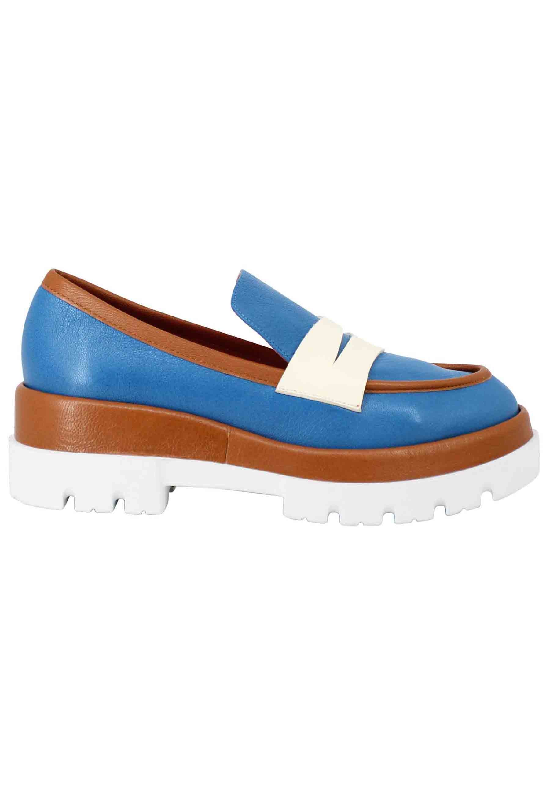 Women's blue leather moccasins with wedge and tan leather inserts