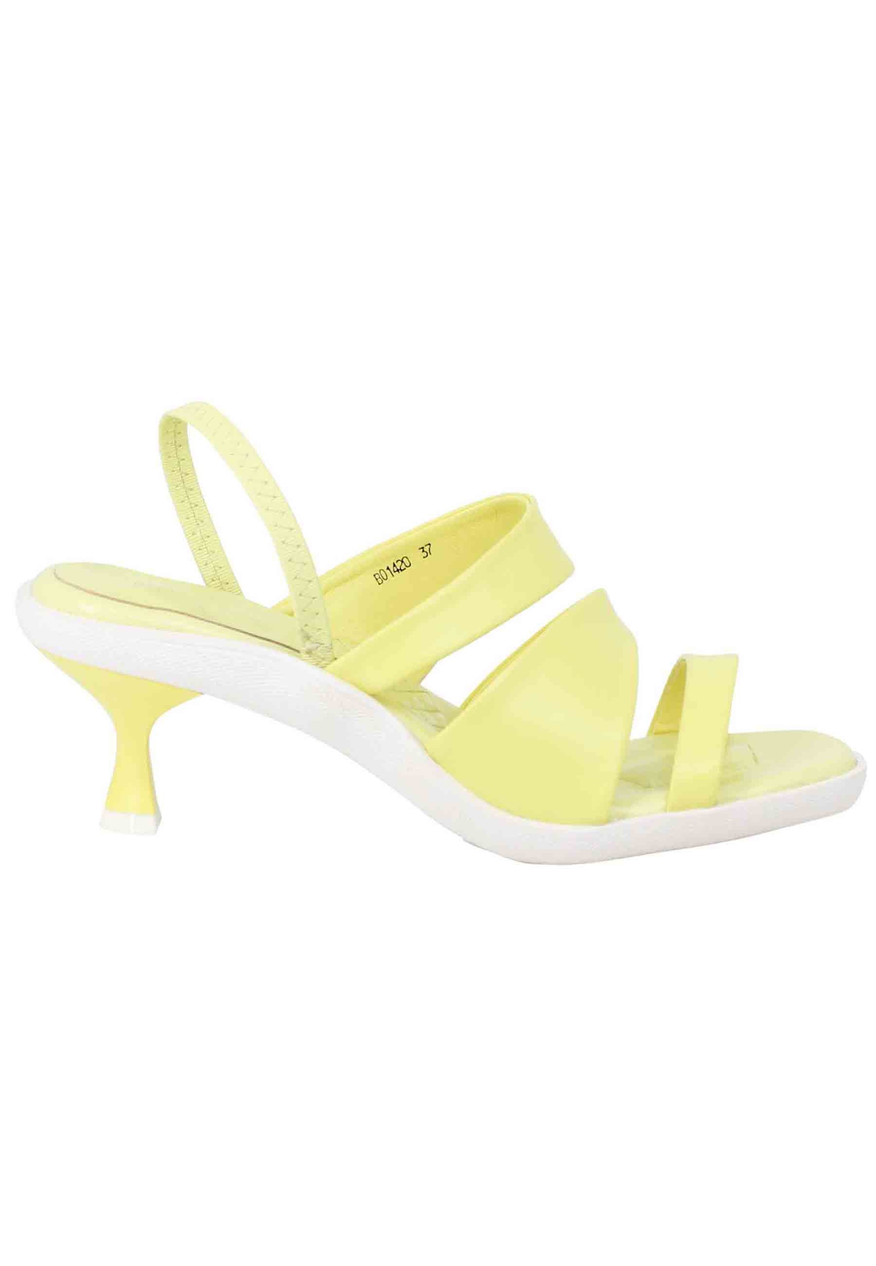 Women's slingbak sandals in yellow leather with rubber sole and colored heel