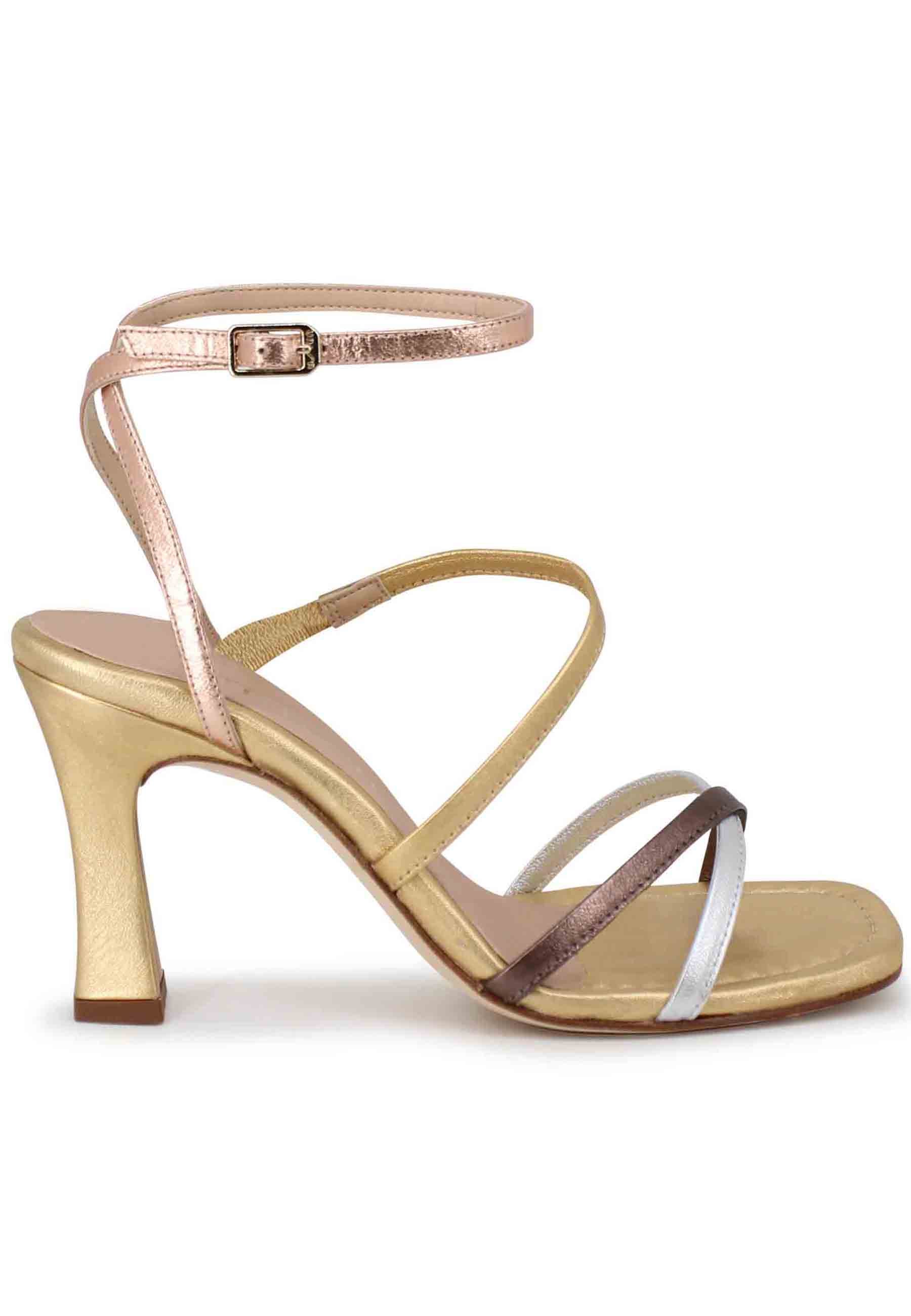 Women's sandals in gold laminated leather with high heel