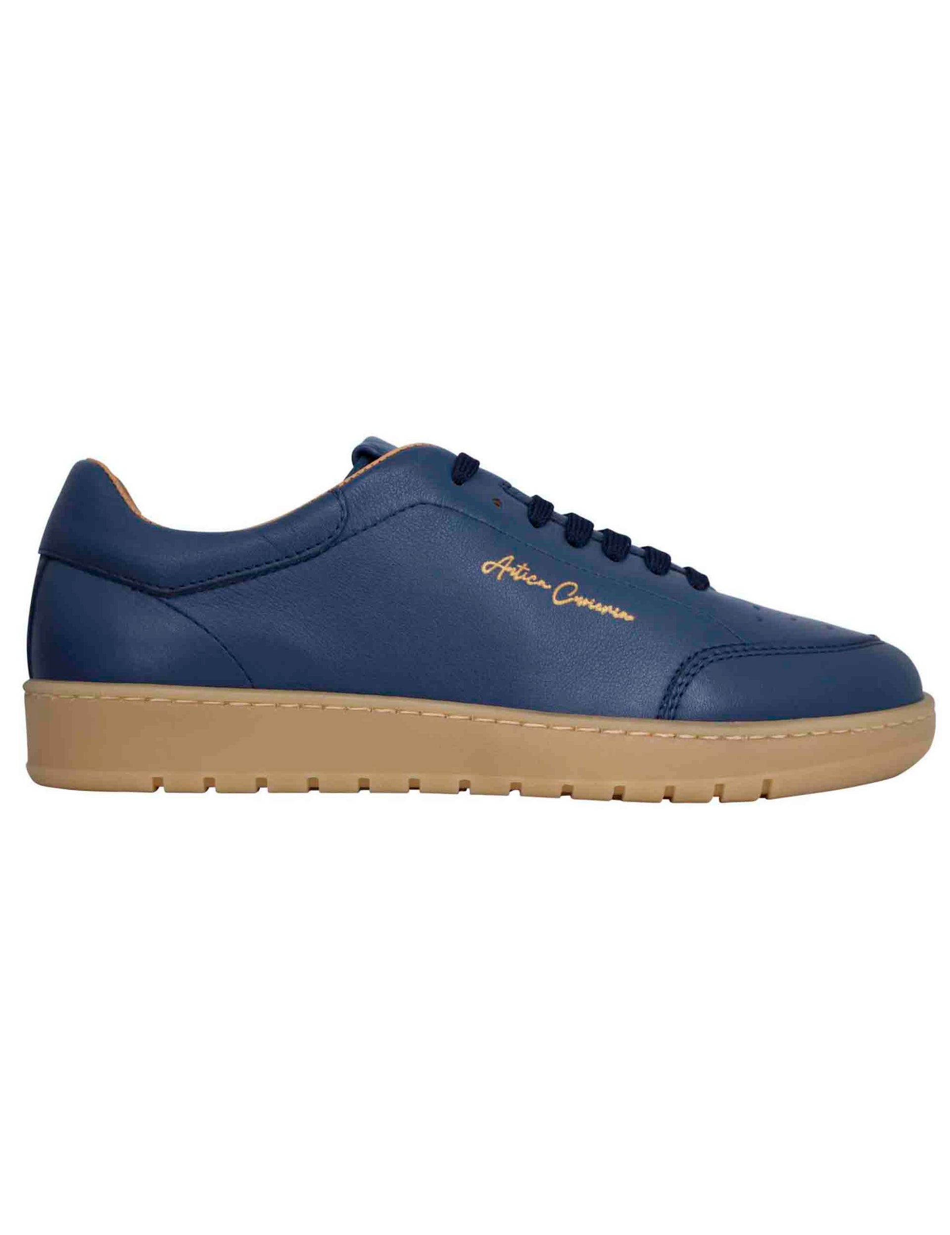 Men's sneakers in light blue leather with amber rubber sole