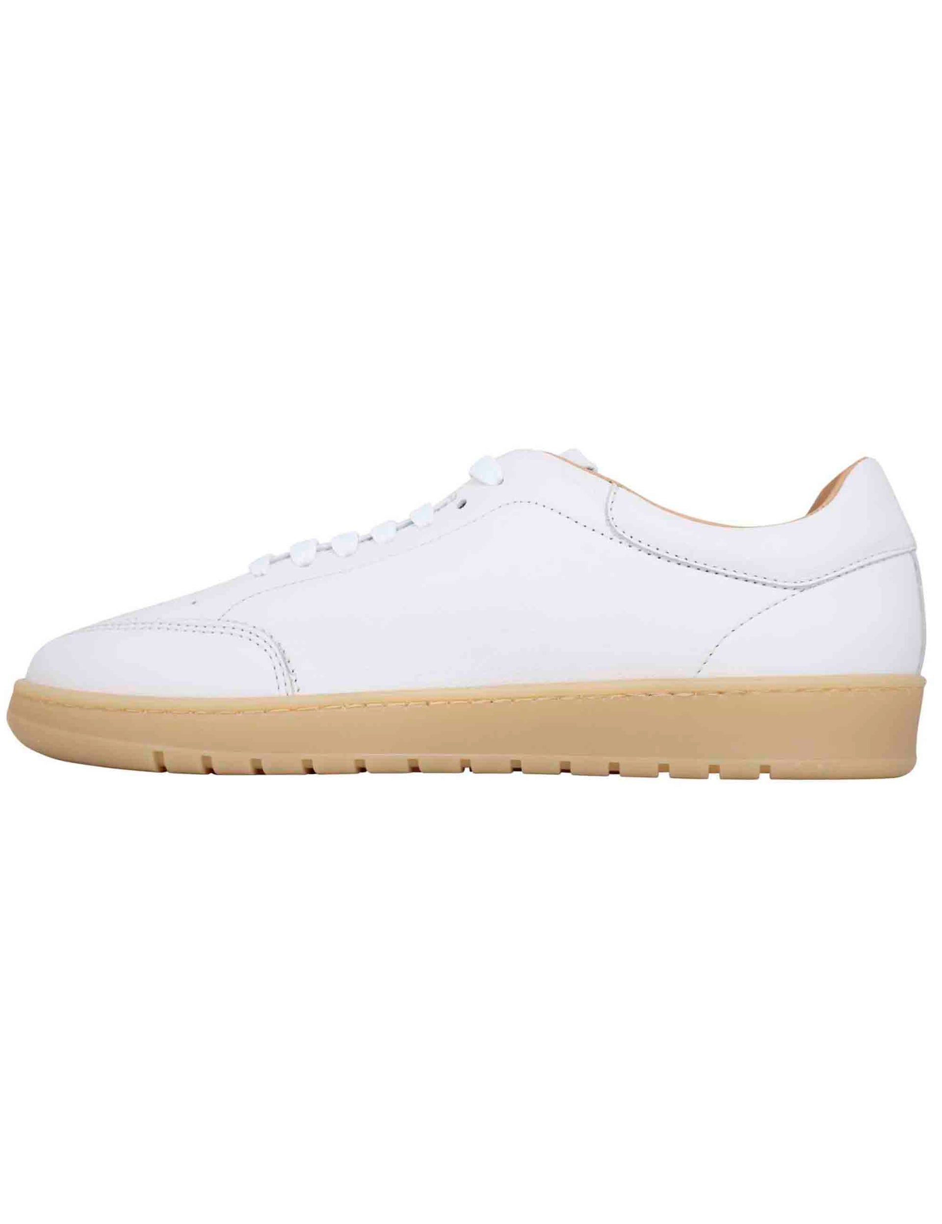 Men's white leather sneakers with amber rubber sole