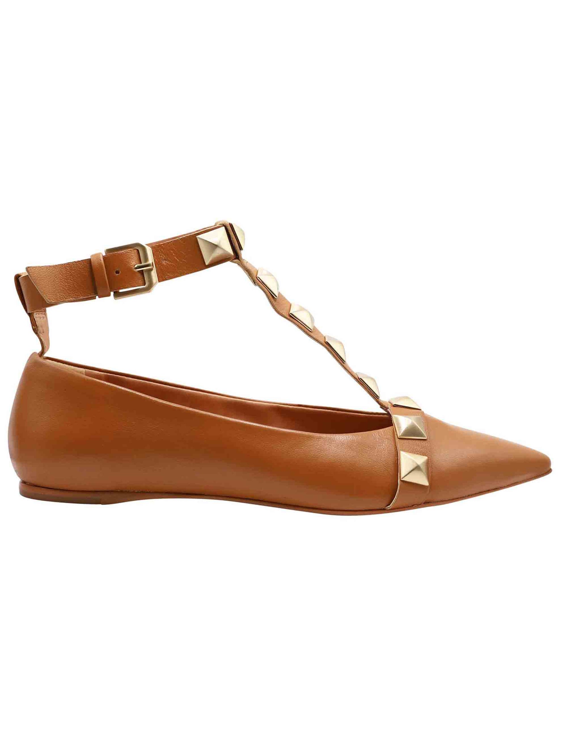 Women's tan leather ballet flats with pointed toe straps and studs