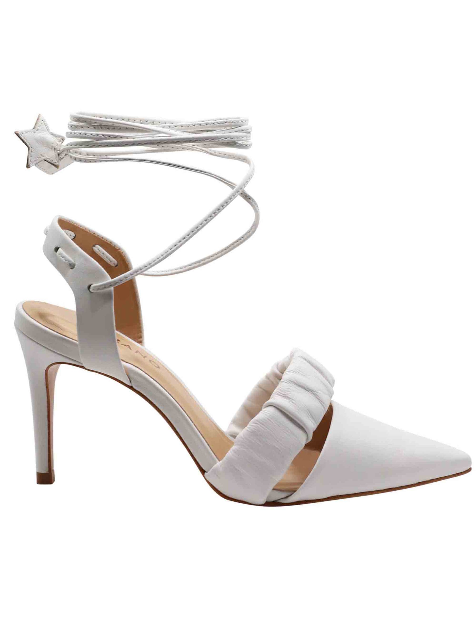 Women's slingback pumps in white leather with ankle straps and high heel