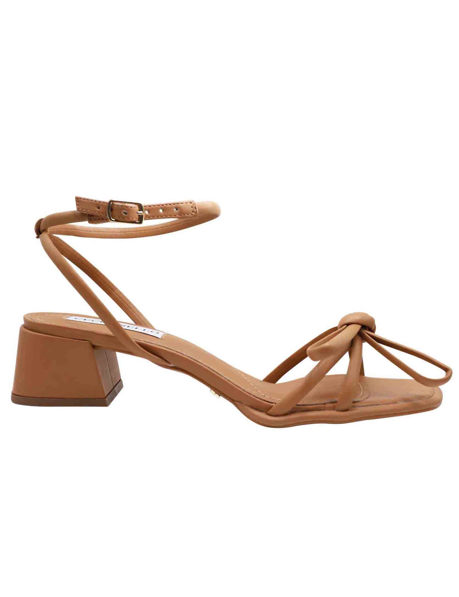 Women's sandals in tan leather with front bow and ankle strap