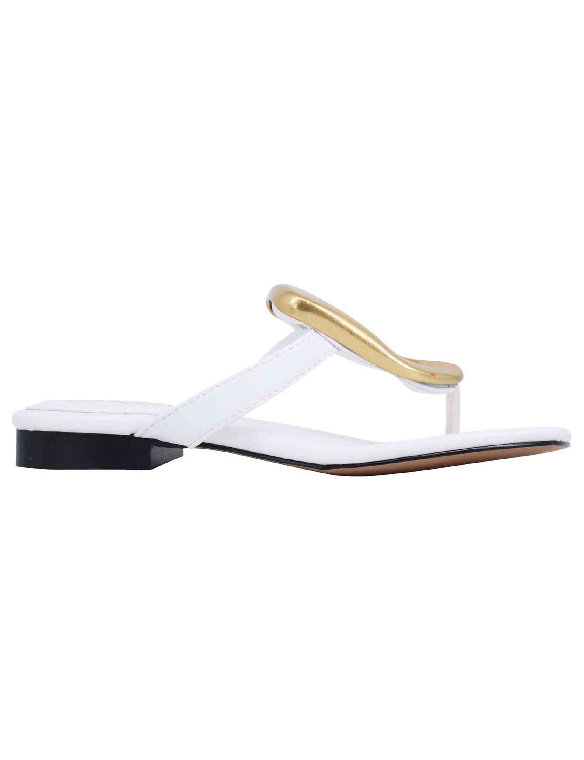 Women's white patent leather thong sandals with low heel and gold accessory