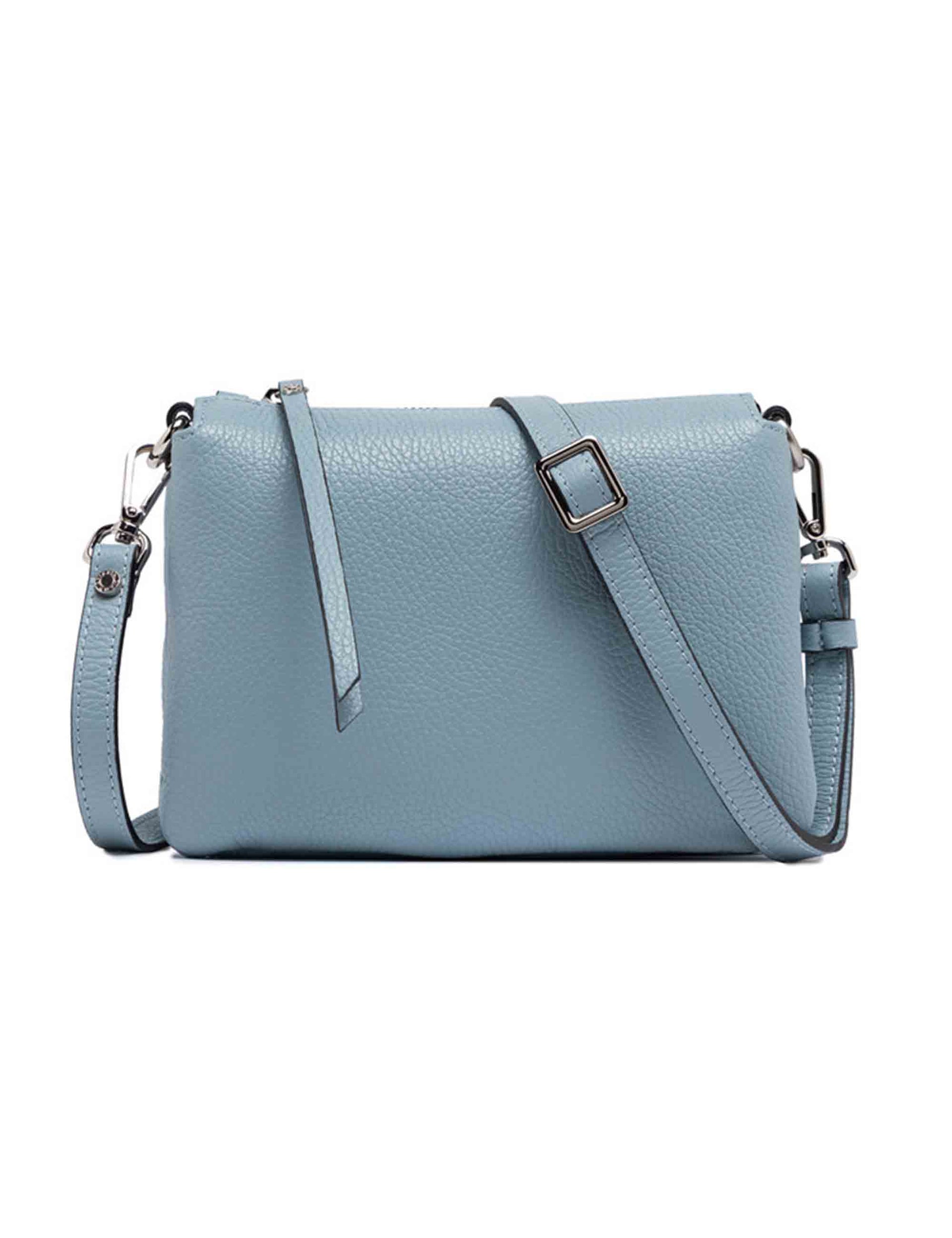 Three women's clutch bags in light blue leather with matching removable shoulder strap