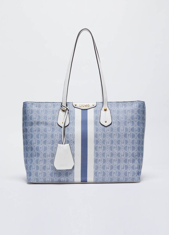 Women's shoulder bags in blue fabric and white leather