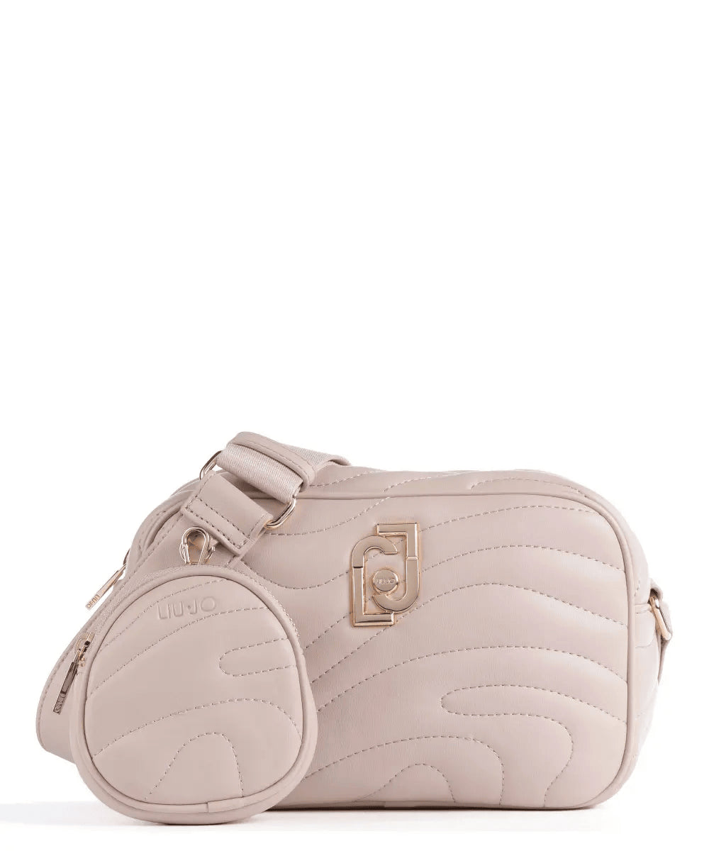 Women's shoulder bags in pink synthetic leather