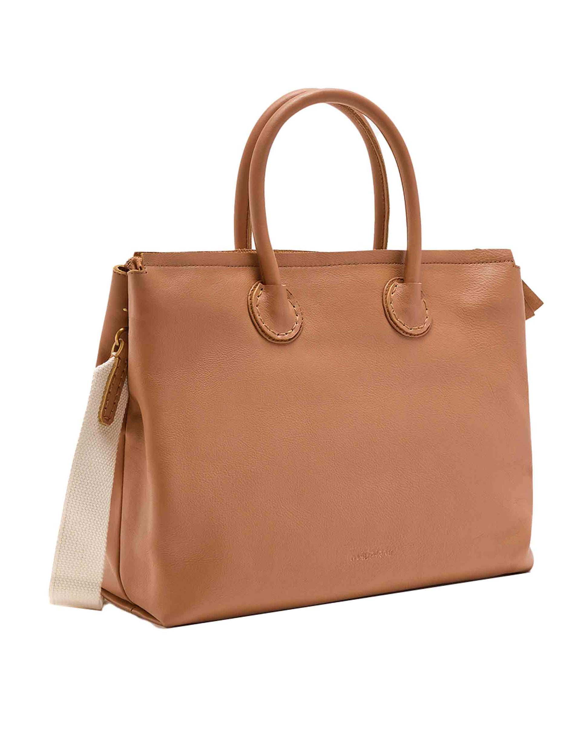 Leather women's shopping bags in tan leather with studs and embroidery