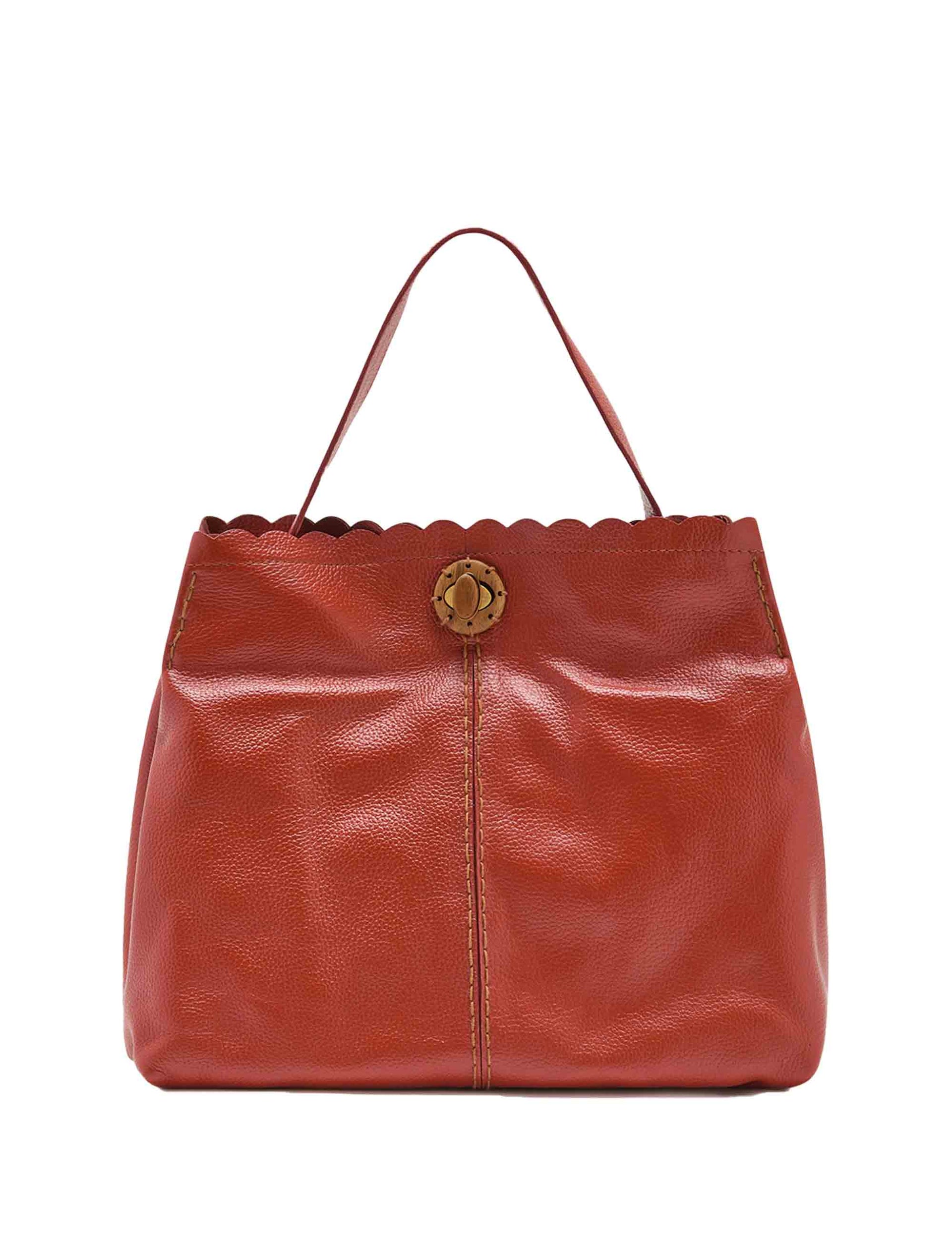 Text Tured women's shoulder bags in tan leather