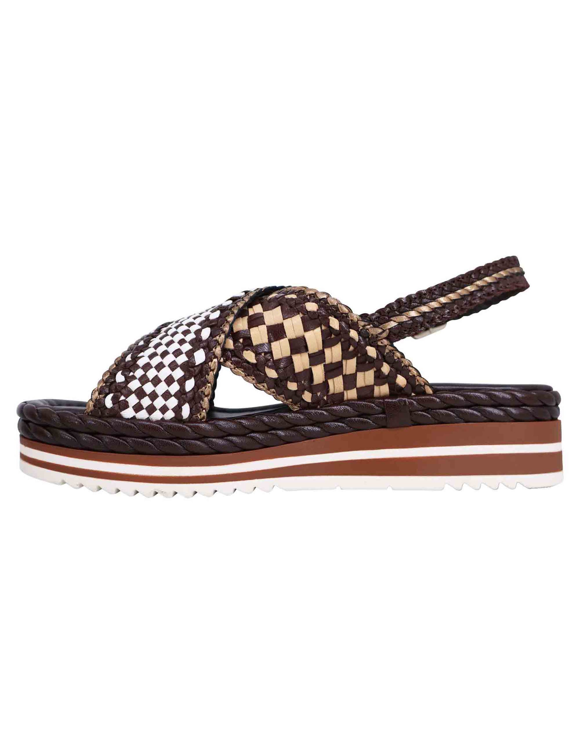Women's slingback sandals in dark woven leather with rubber wedge