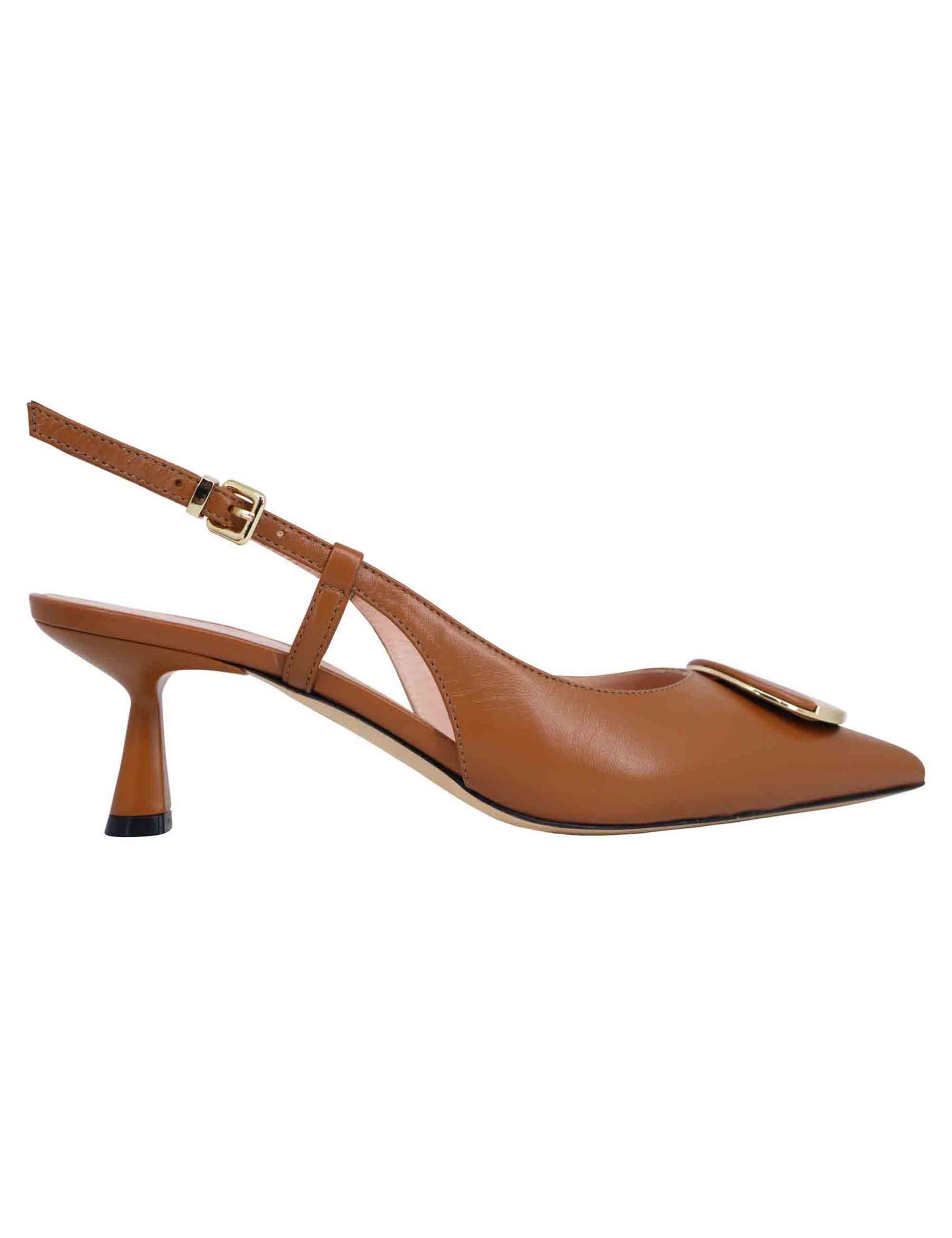 Women's slingback pumps in tan leather with low heel and gold buckle