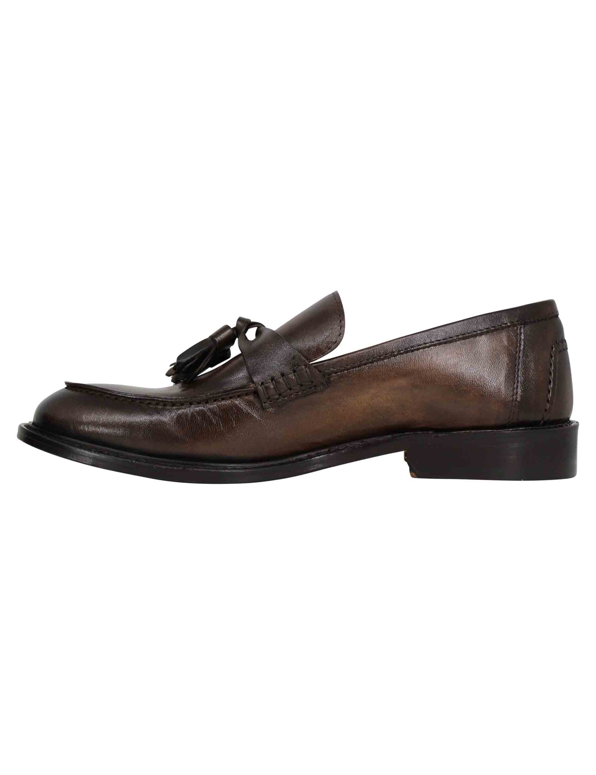 Men's brown leather loafers with bows and stitched leather sole