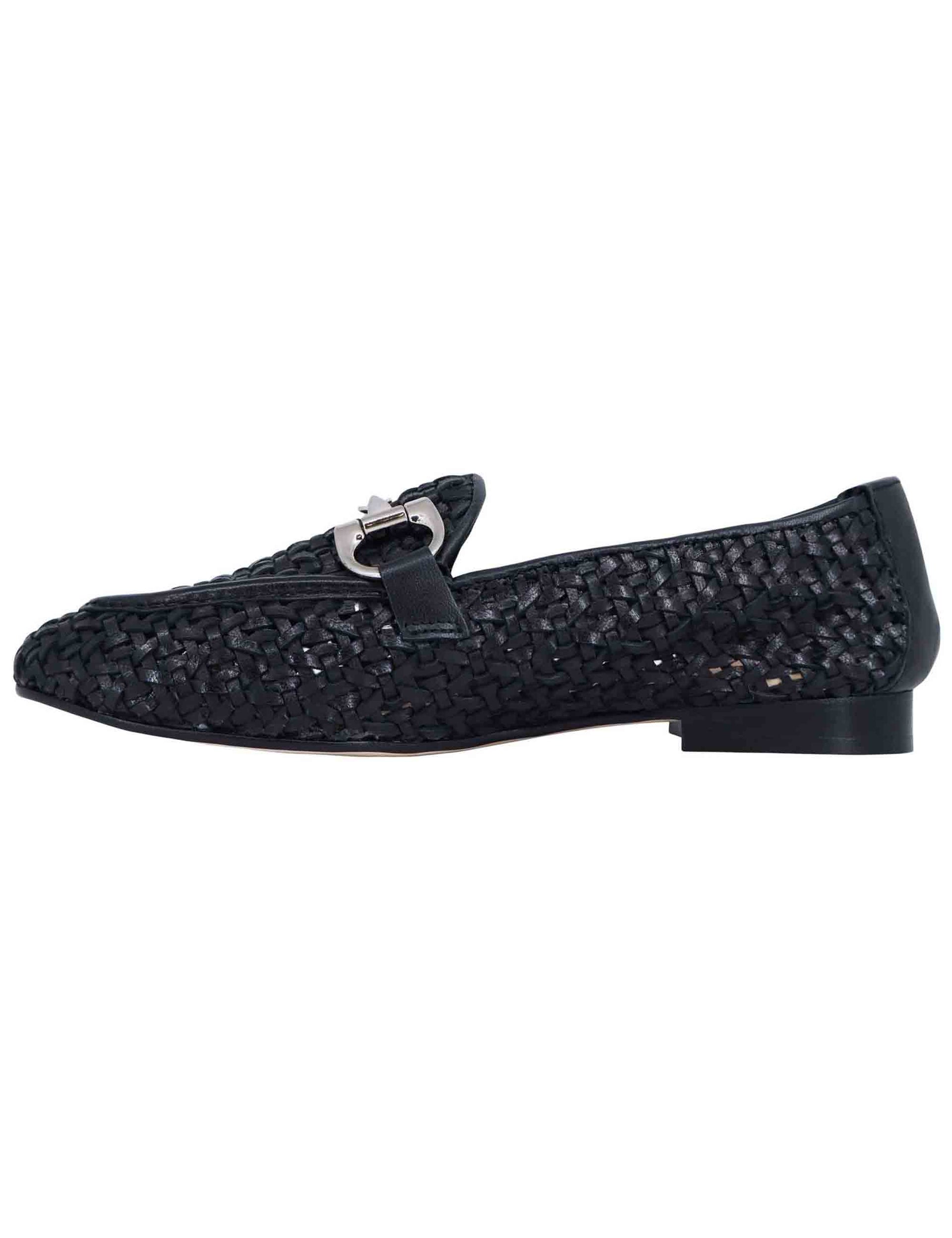 Women's loafers in black woven and perforated leather with silver clamp