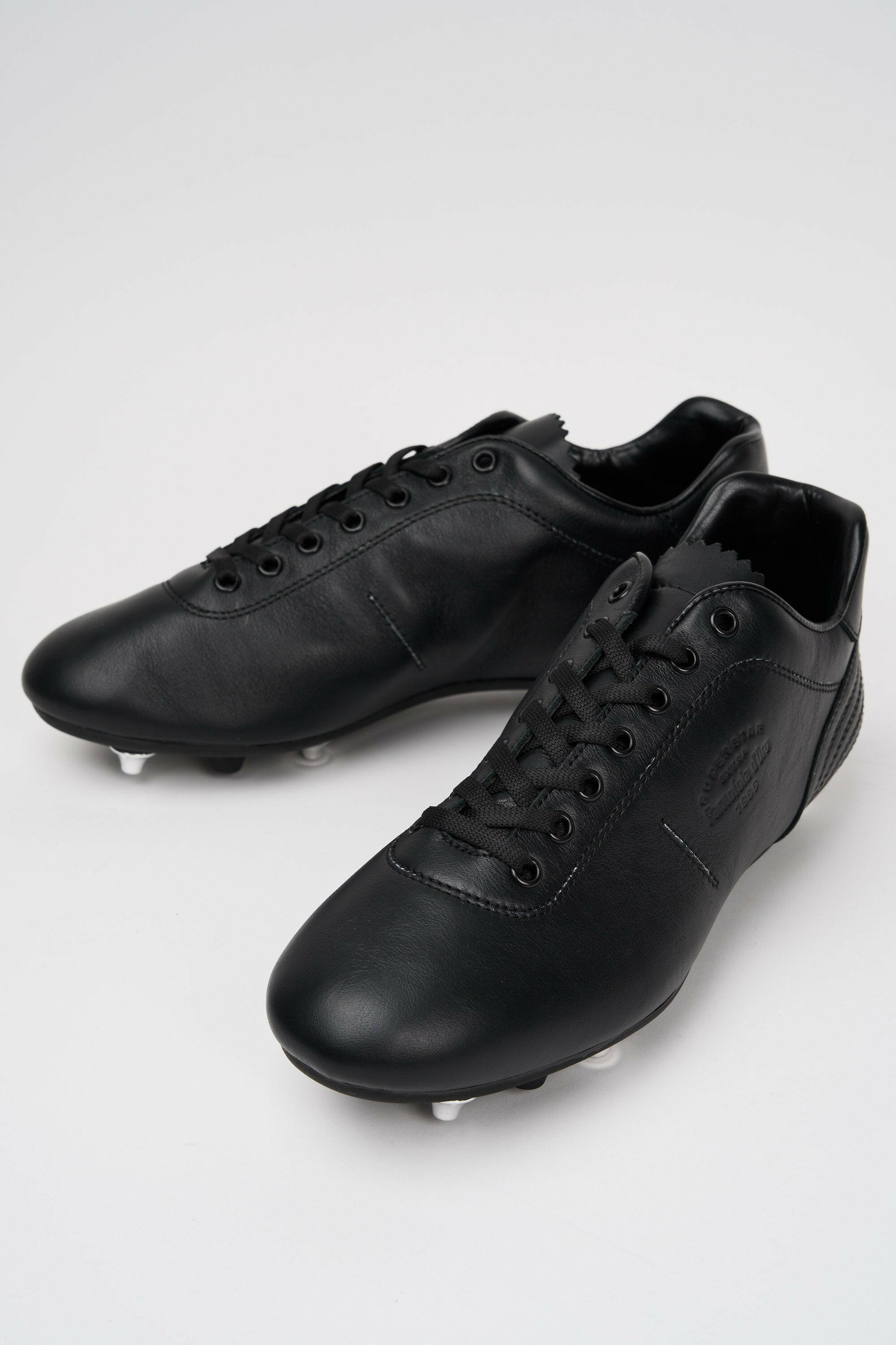 Scarpe da calcio Lazzarini in pelle nera.