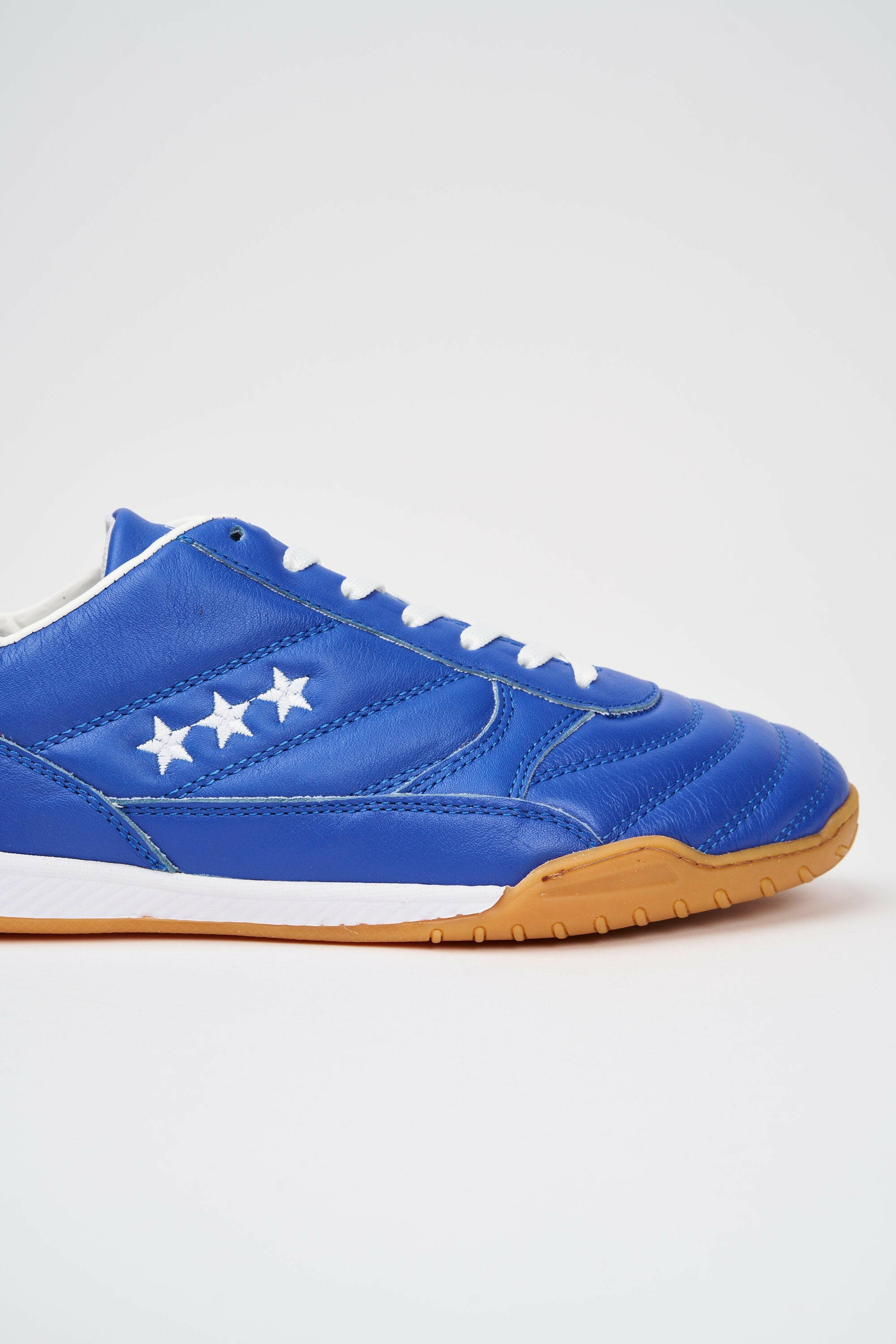 Scarpe da calcio indoor Alloro in pelle blu.