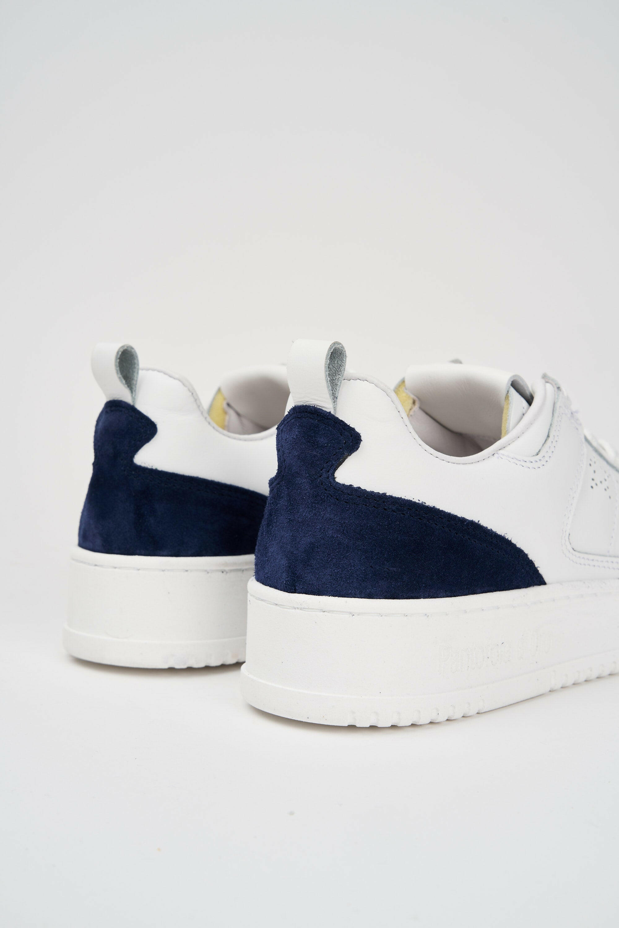 Sneakers uomo Penalty in pelle bianca e blu.