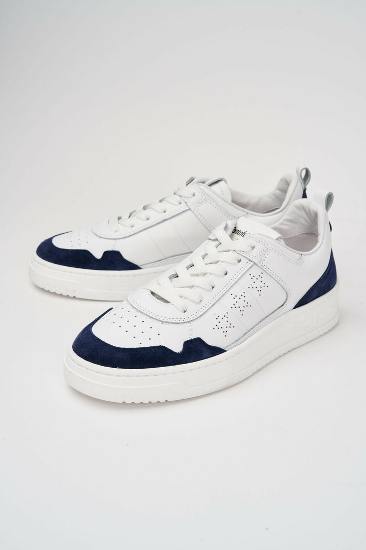 Sneakers uomo Penalty in pelle bianca e blu.