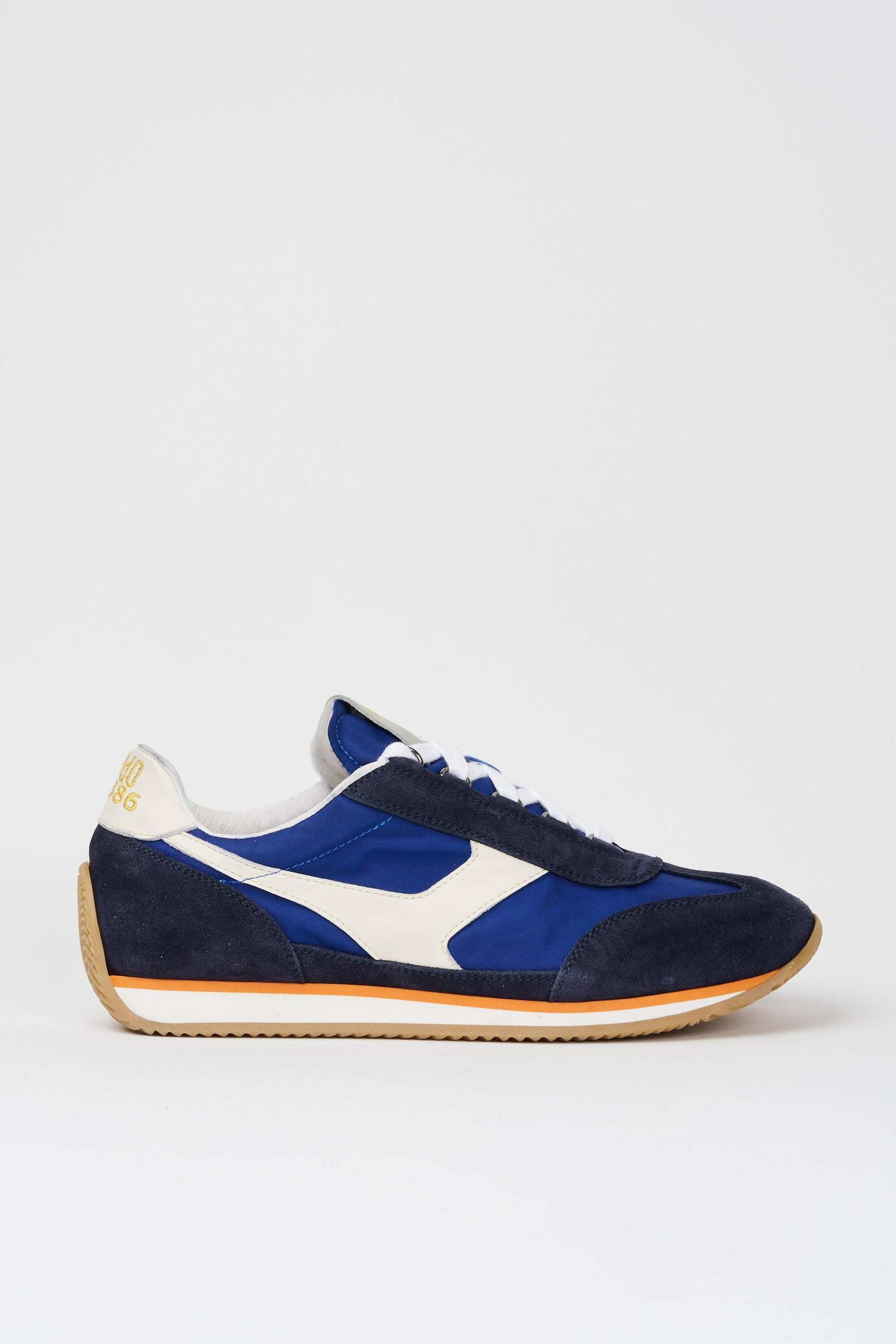 Sneakers uomo Trainer '74 in camoscio blu e tessuto 001.