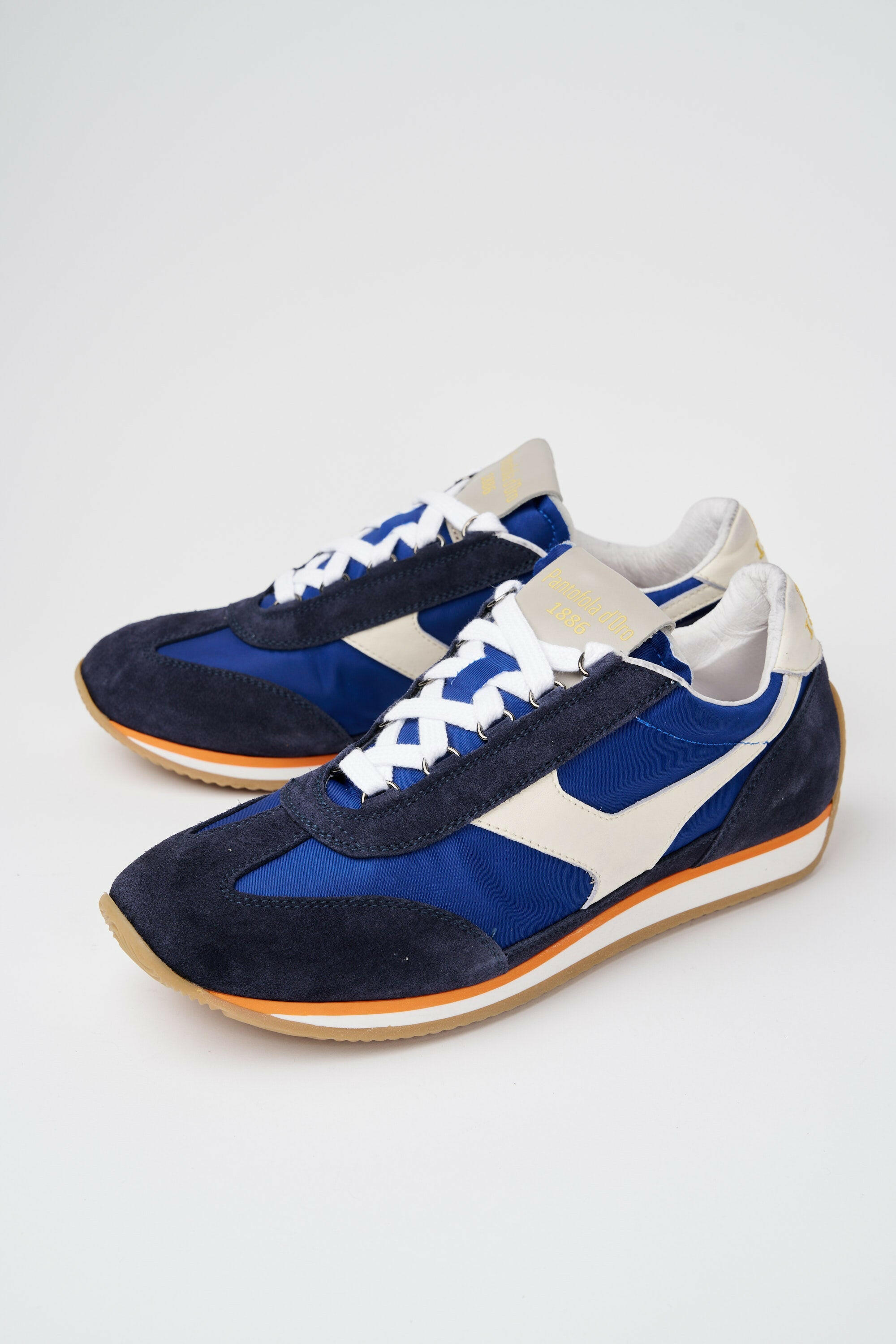 Sneakers uomo Trainer '74 in camoscio blu e tessuto 001.