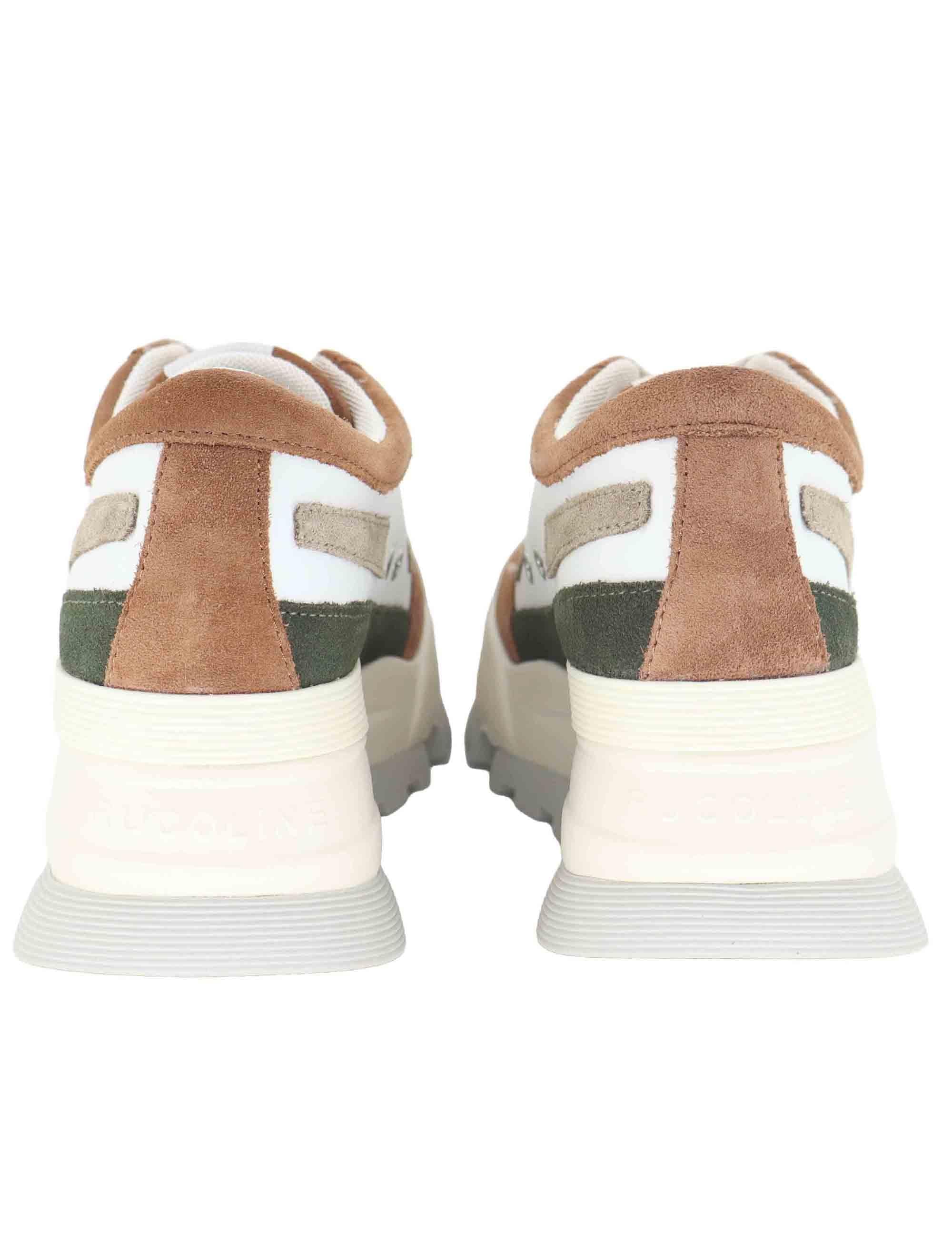 Sneakers donna in pelle bianca con zeppa alta in gomma 0304-84568 329BB Ruco Line 