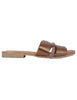 Women's flat sandals in bronze laminated leather with studs